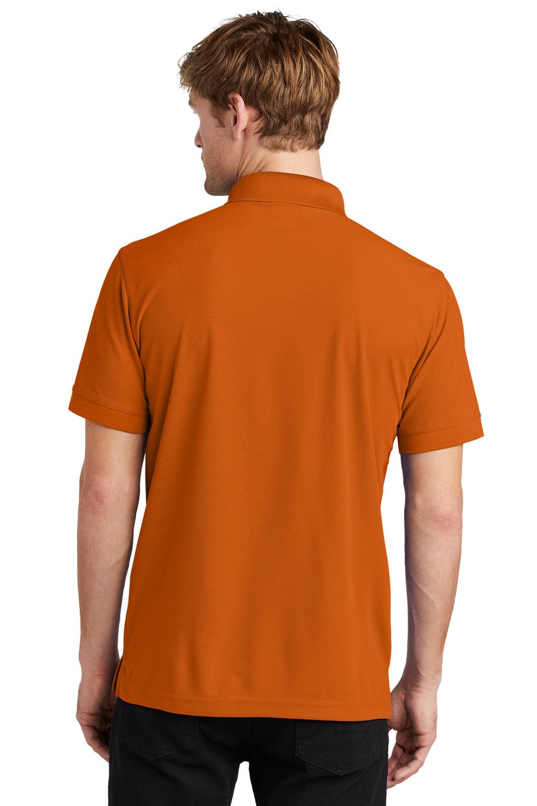 A back view of an orange OGIO Caliber 2.0 polo shirt, featuring a collar and short sleeves.
