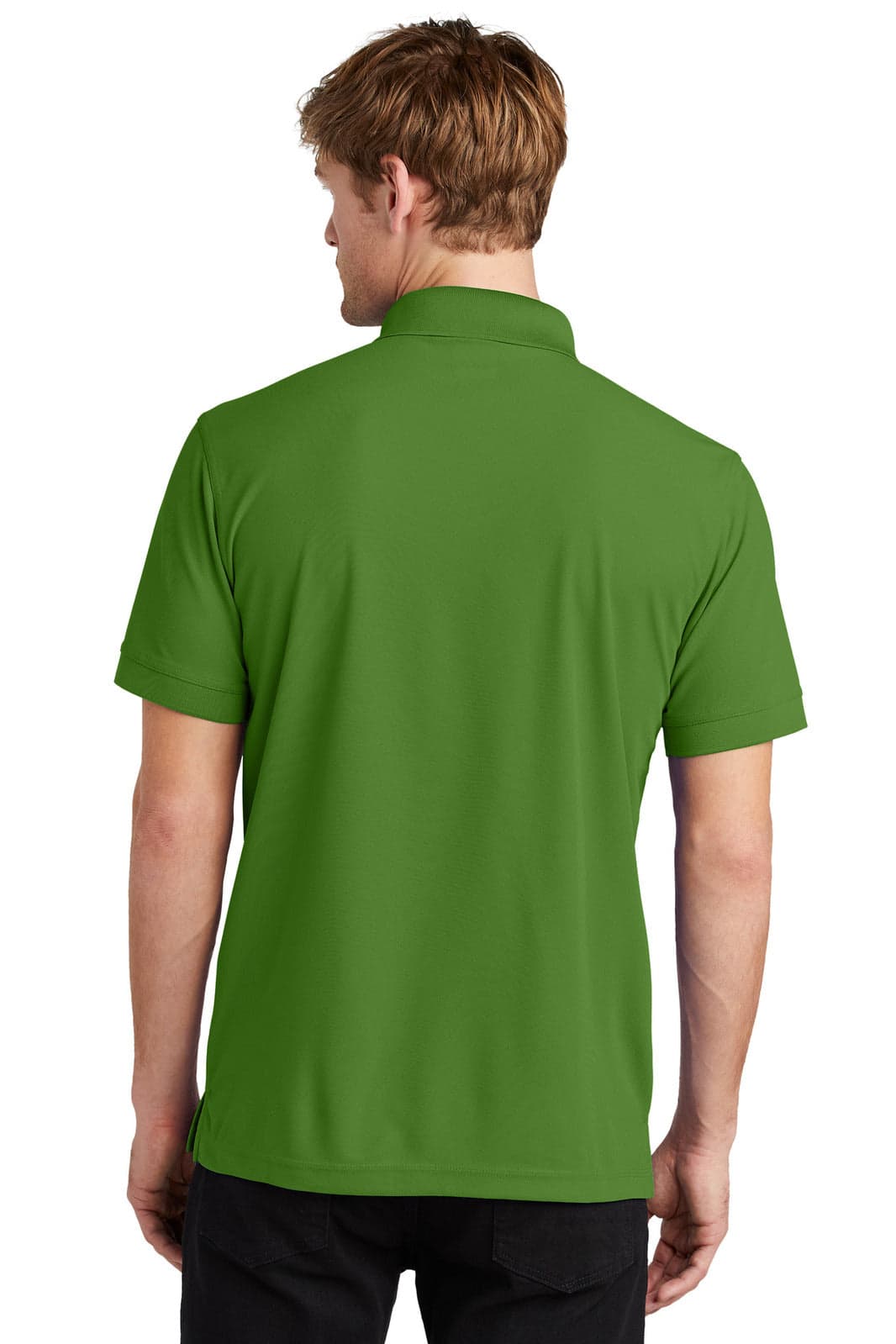 A man wearing a green OGIO - Caliber2.0 Polo shirt, showcasing the back view of the garment.