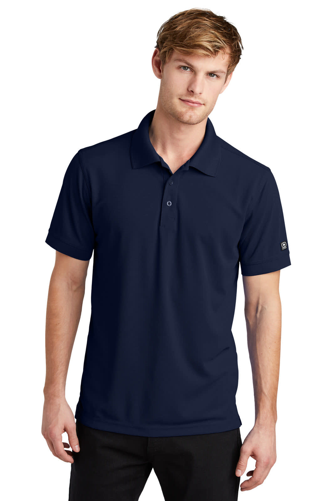 A navy polo shirt with a collar and short sleeves, featuring a logo on the sleeve.