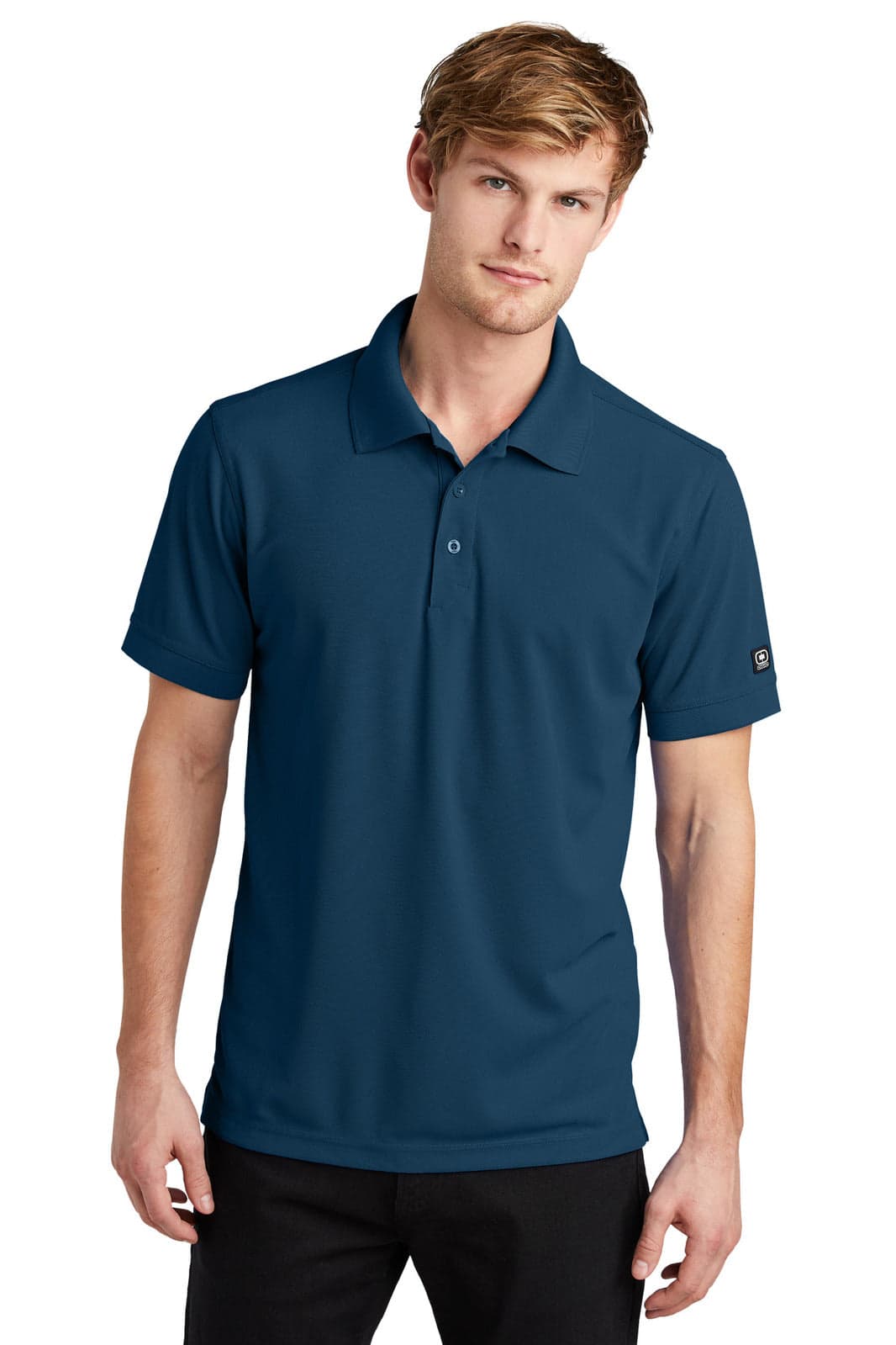 A navy blue polo shirt with a collar and short sleeves, featuring a logo on the sleeve.