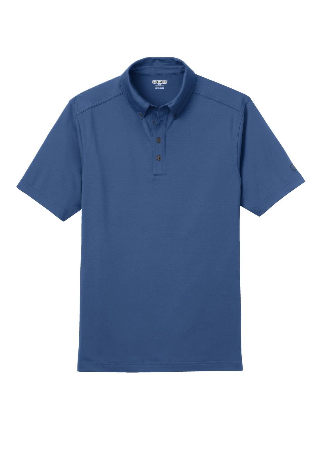 A blue OGIO Gauge Polo shirt with a collared neck and a few buttons, featuring a logo on one sleeve.