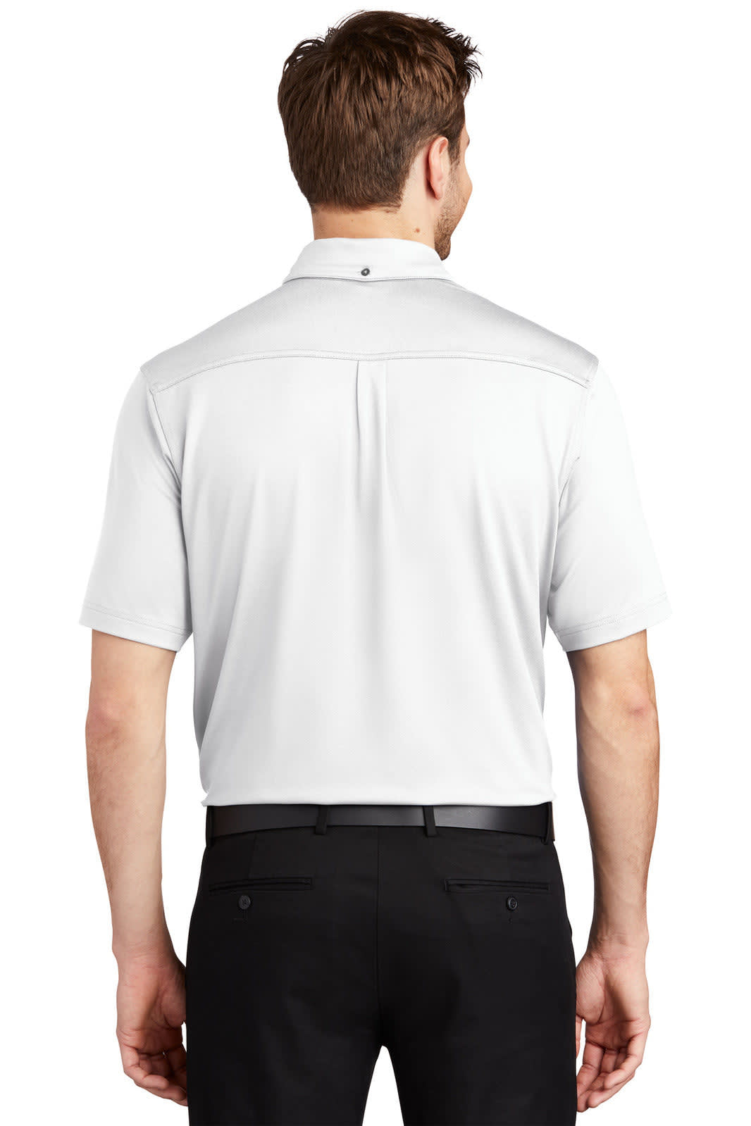 A white polo shirt viewed from the back, featuring a logo and worn with black trousers.