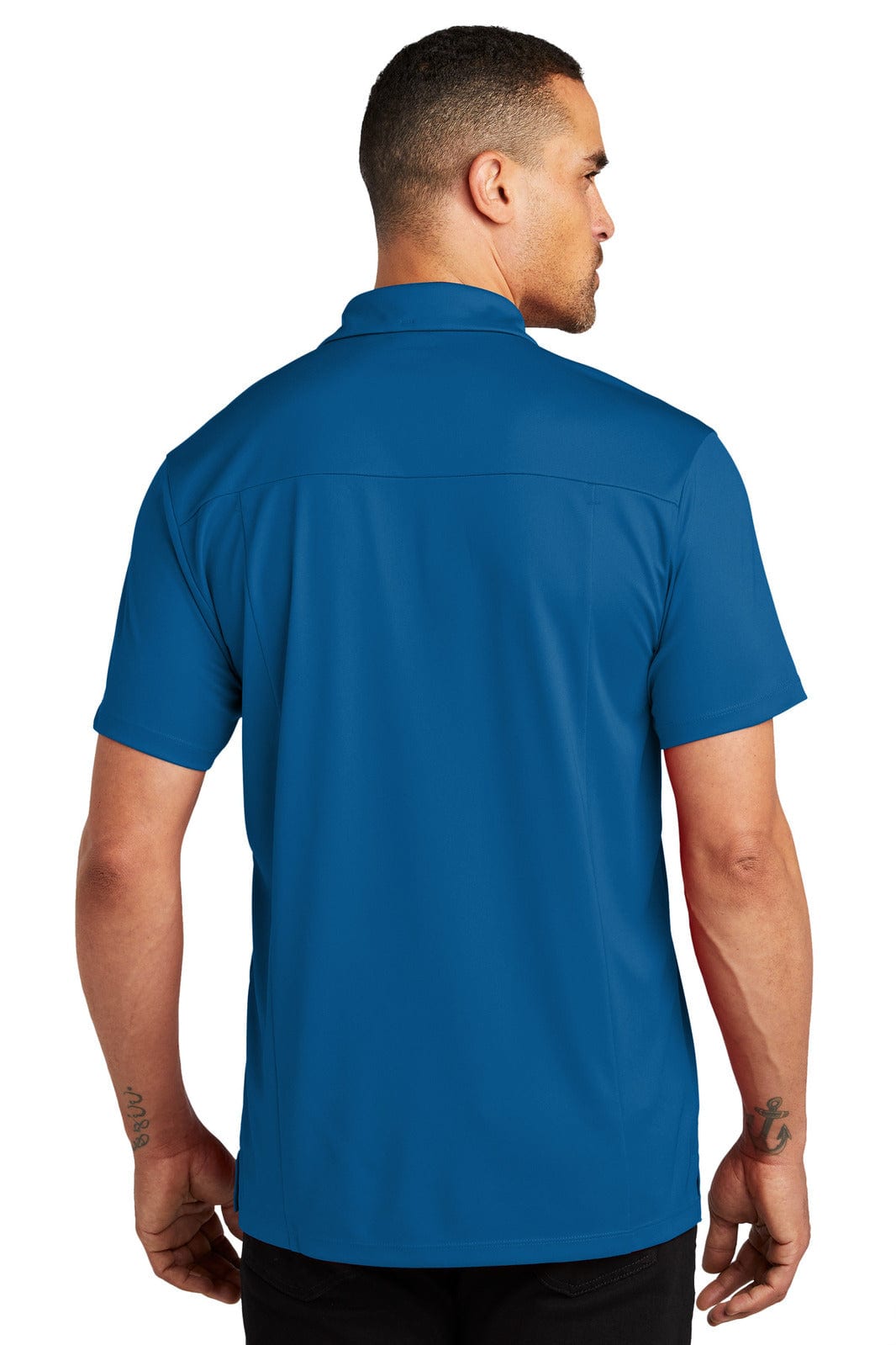A blue OGIO Framework Polo shirt displayed from the back, featuring short sleeves and a subtle logo.