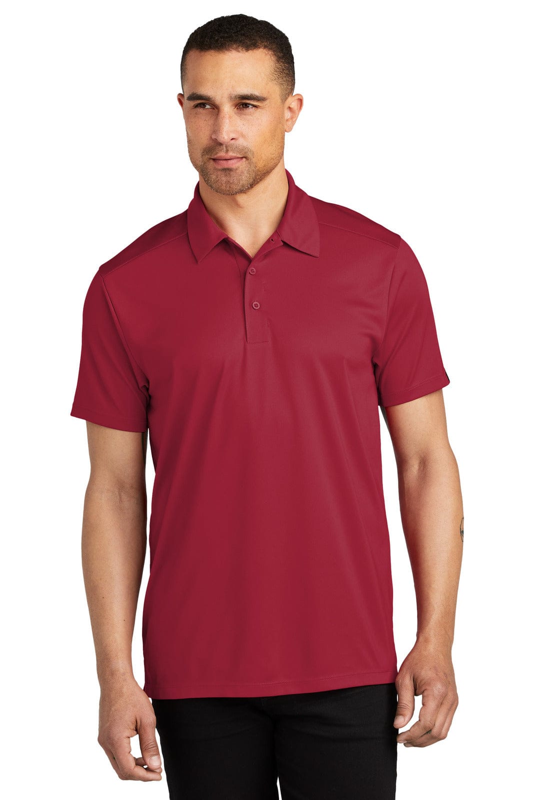 A red polo shirt with a collar and short sleeves, featuring a logo on the chest.