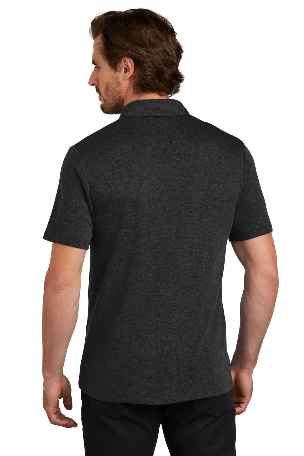 A man wearing a dark grey OGIO Command Polo shirt, viewed from the back. The shirt features a logo.