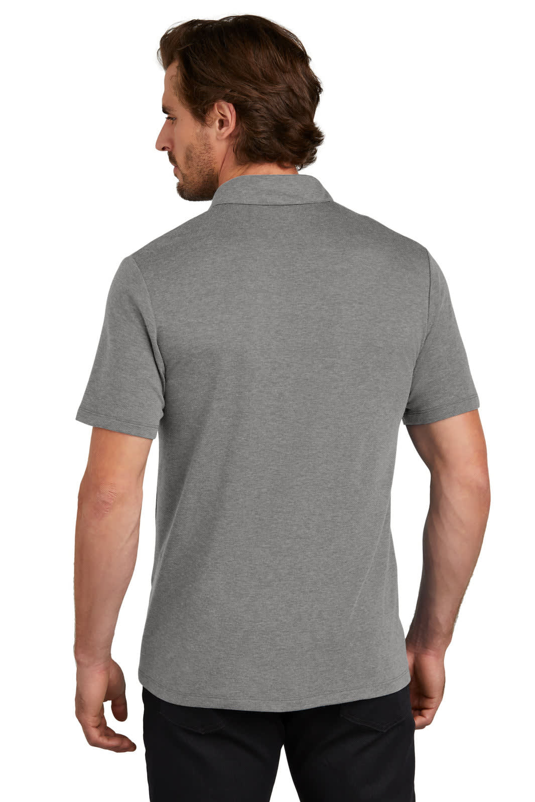 A man wearing a grey OGIO Command Polo shirt, viewed from the back. The shirt has a collar and short sleeves.