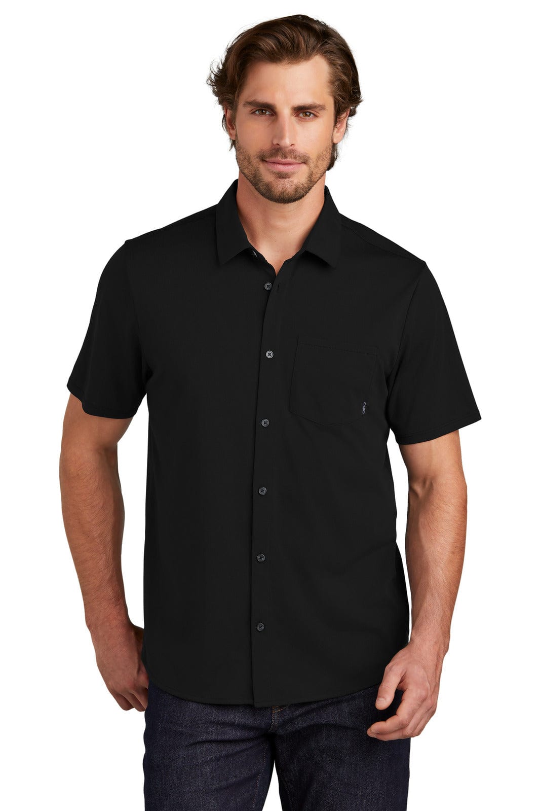 A short sleeve, black button-up shirt with a chest pocket and a logo on it, designed for casual wear.