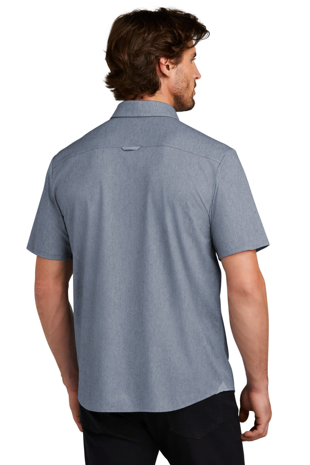 A short-sleeve button-up shirt in light grey, featuring a back yoke and a logo.