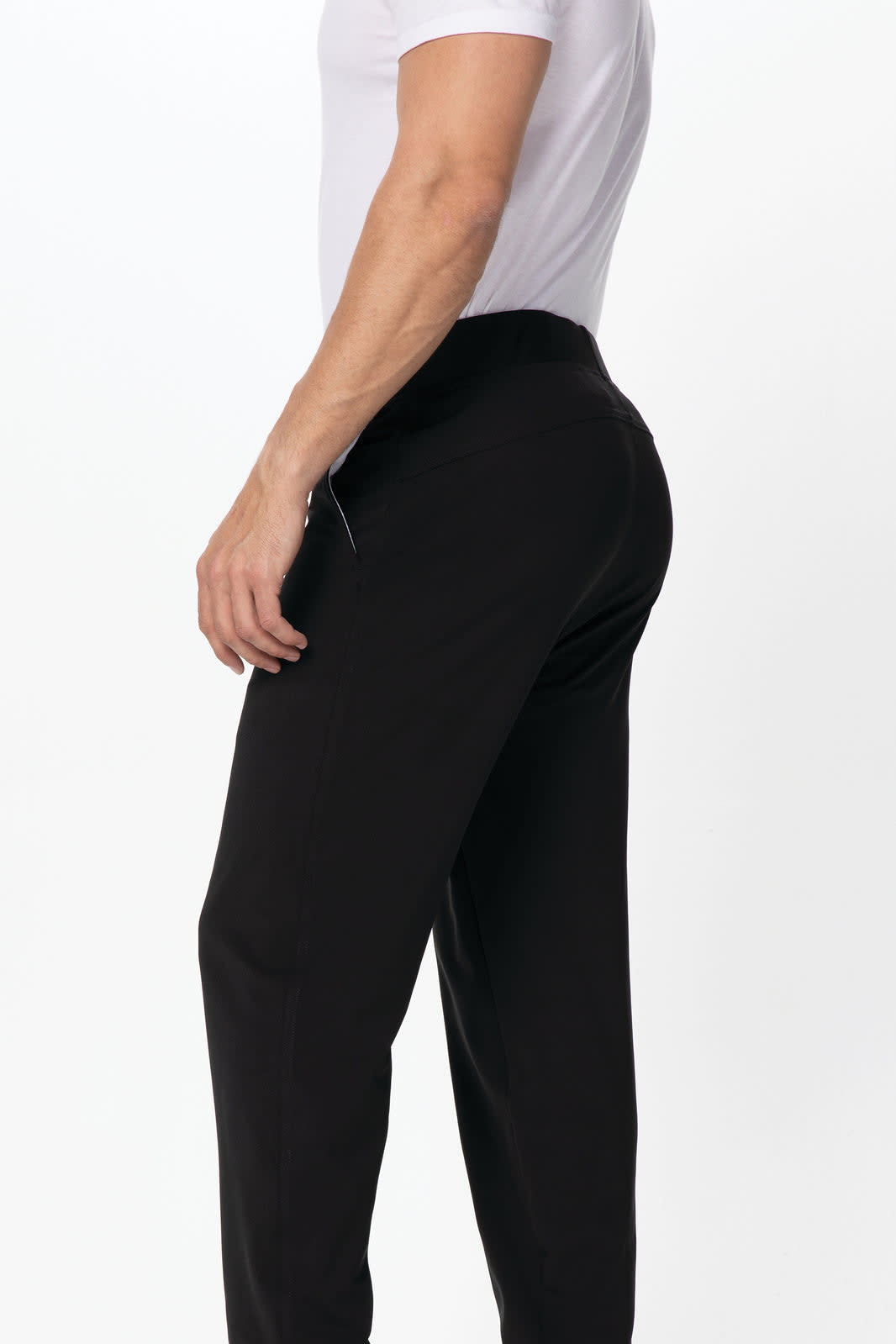 Black men's chef pants are displayed, featuring a relaxed fit and a zip detail on the side.