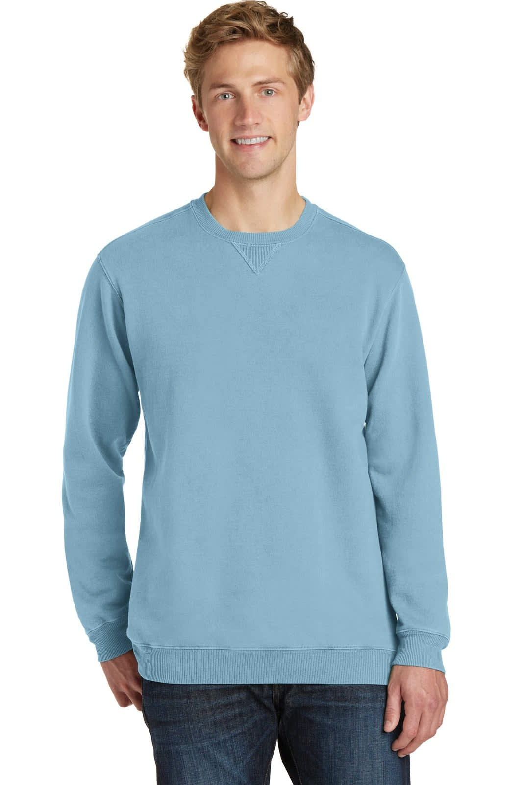 A light blue crewneck sweatshirt on a model, featuring a casual style and ribbed cuffs. It has a logo.