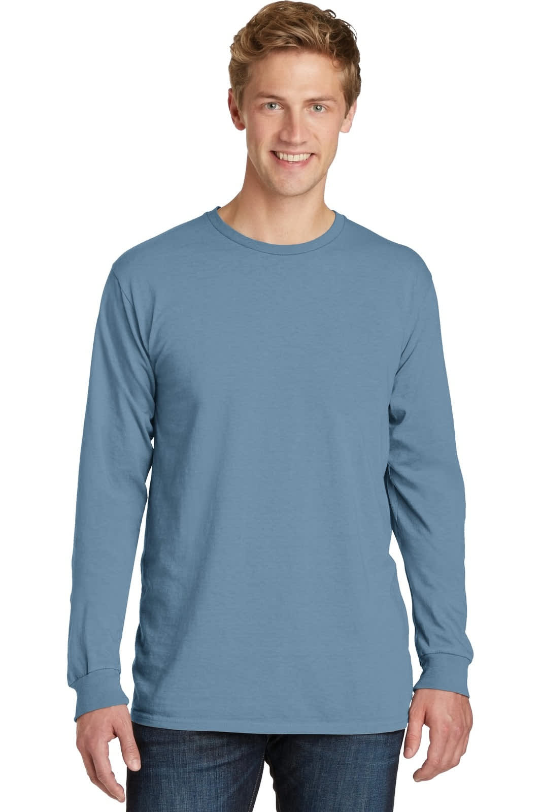 A man wearing a long sleeve tee in a soft blue colour, featuring a simple design and a logo on the chest.