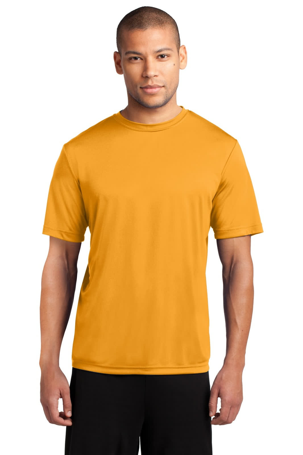 A man is wearing a bright yellow performance t-shirt. The shirt features a logo on the chest area.