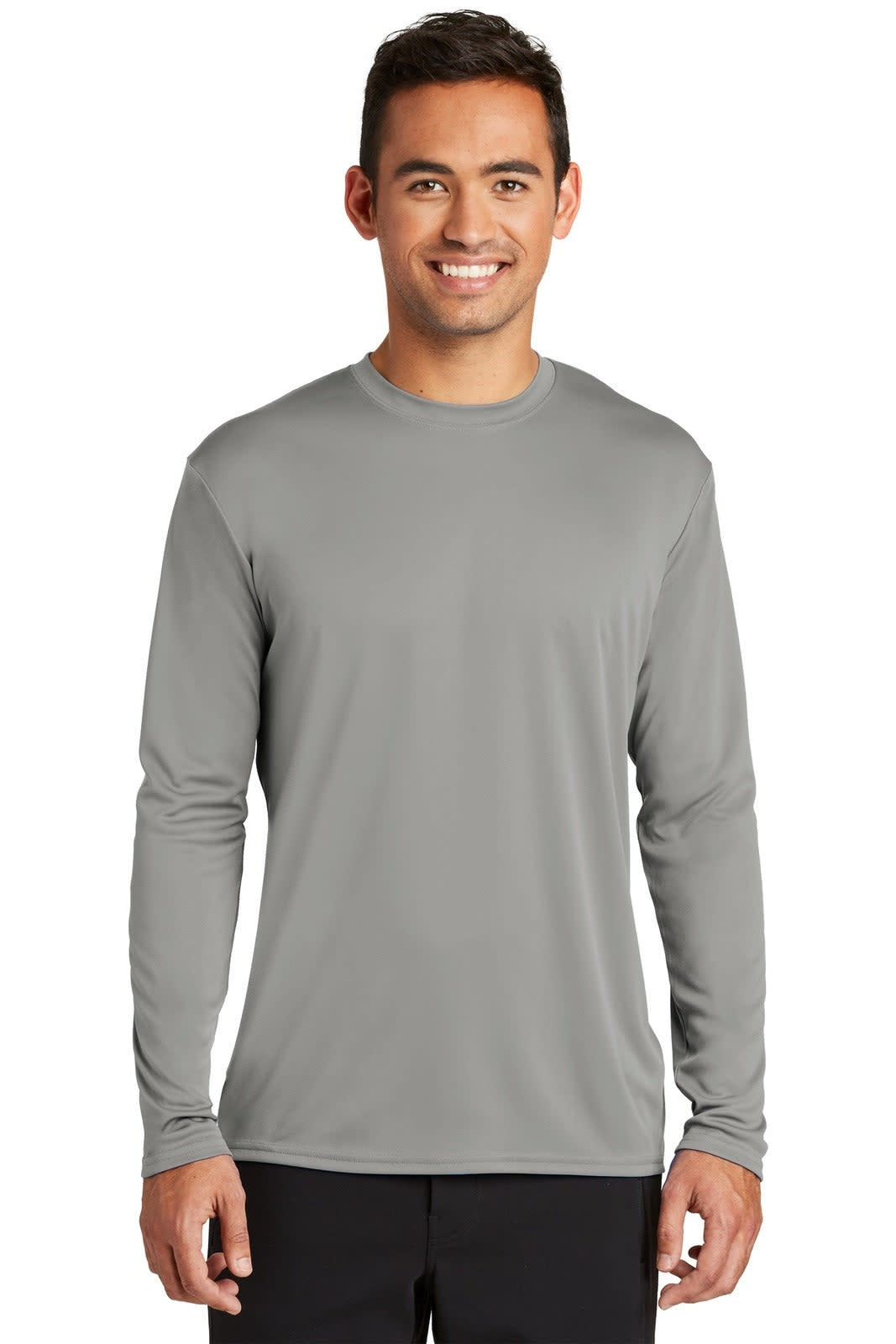 A long sleeve performance tee in grey, featuring a simple design and a logo on the shirt.