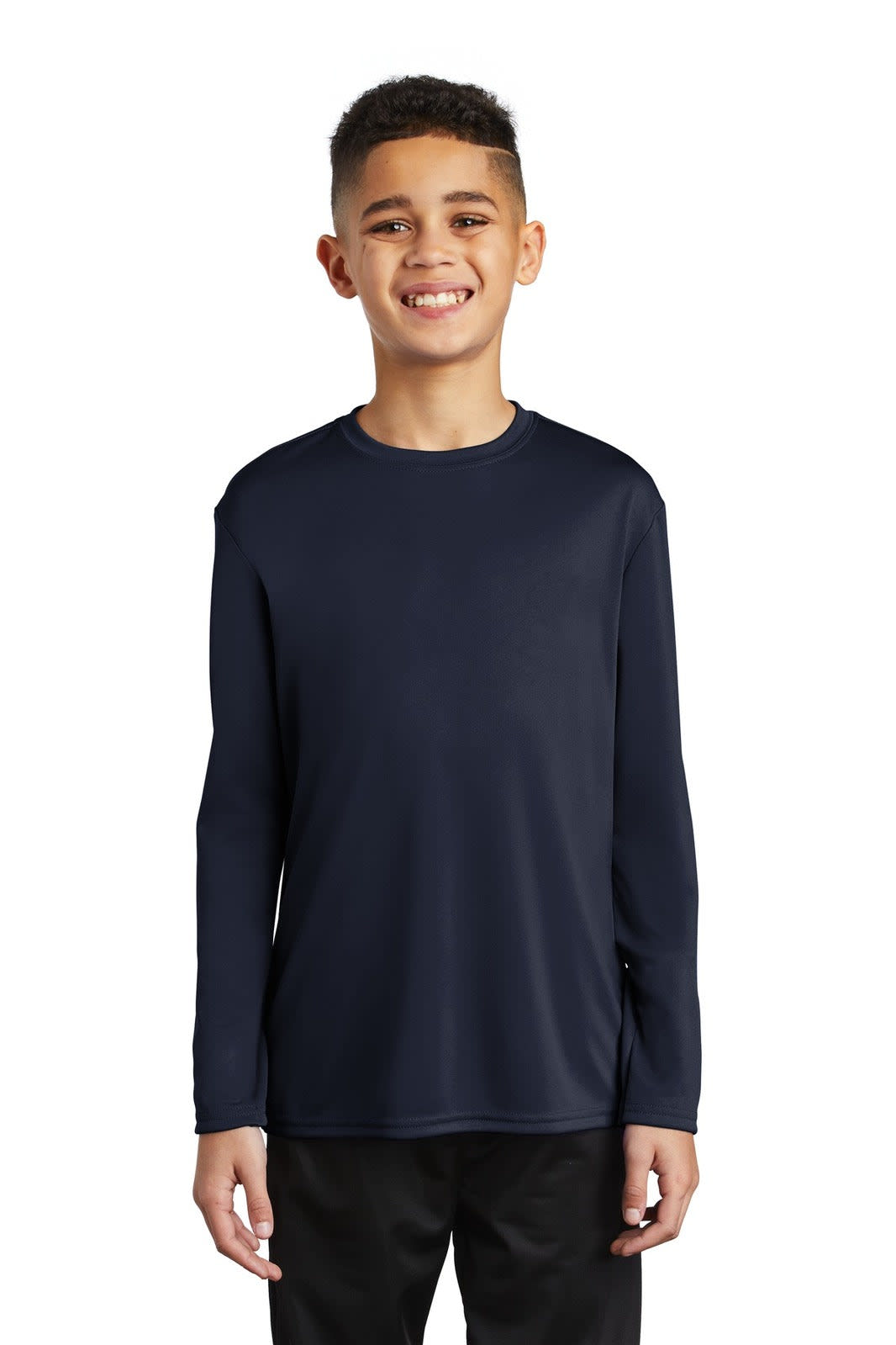 A youth wearing a navy long sleeve performance tee, featuring a simple design and a logo on the chest.