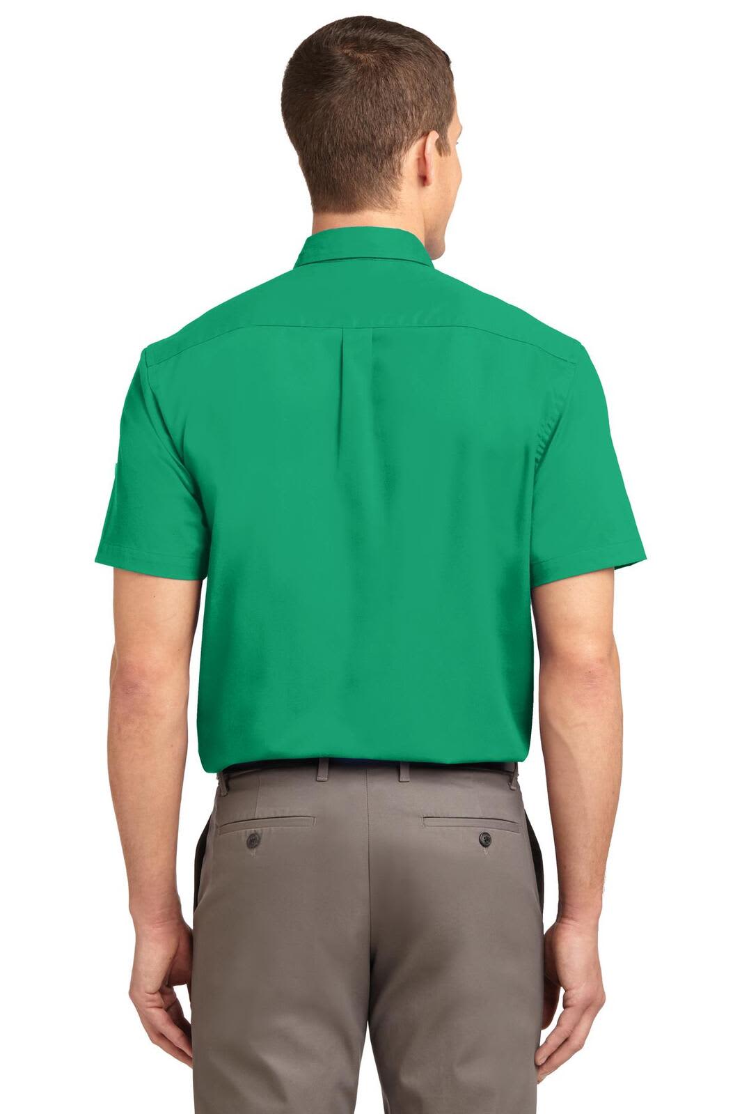 A green short sleeve button-up shirt with a back yoke and a logo.
