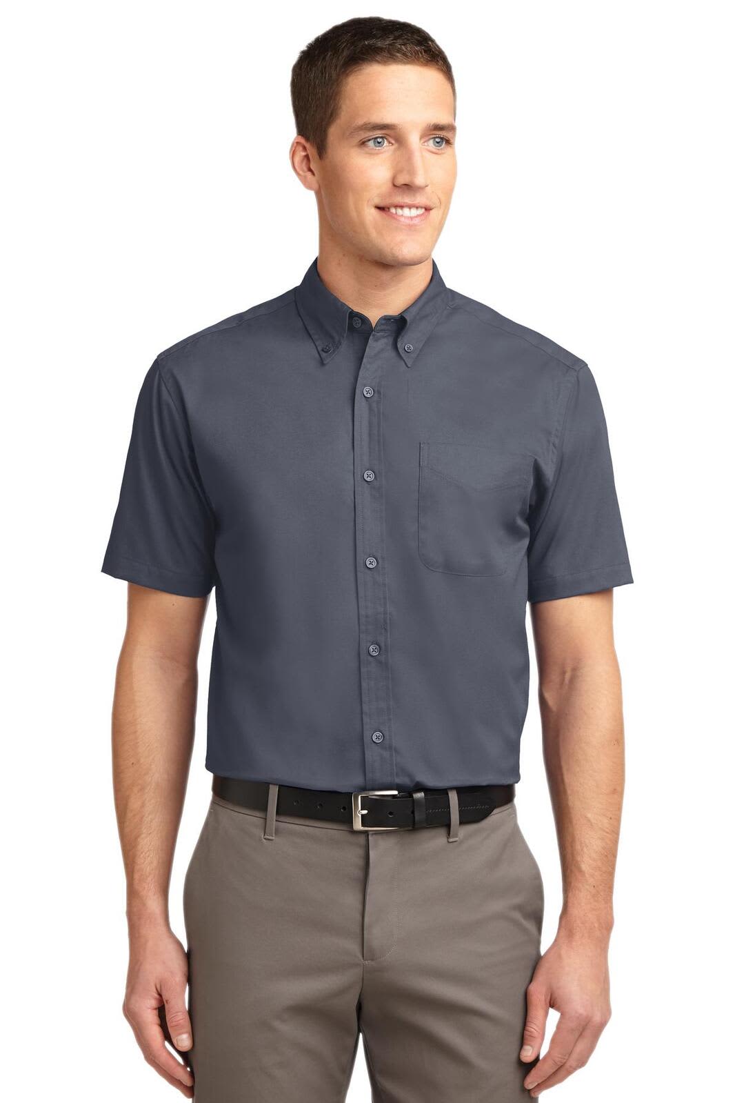 A short-sleeve button-up shirt in navy blue, featuring a collar and a chest pocket, with a subtle logo.