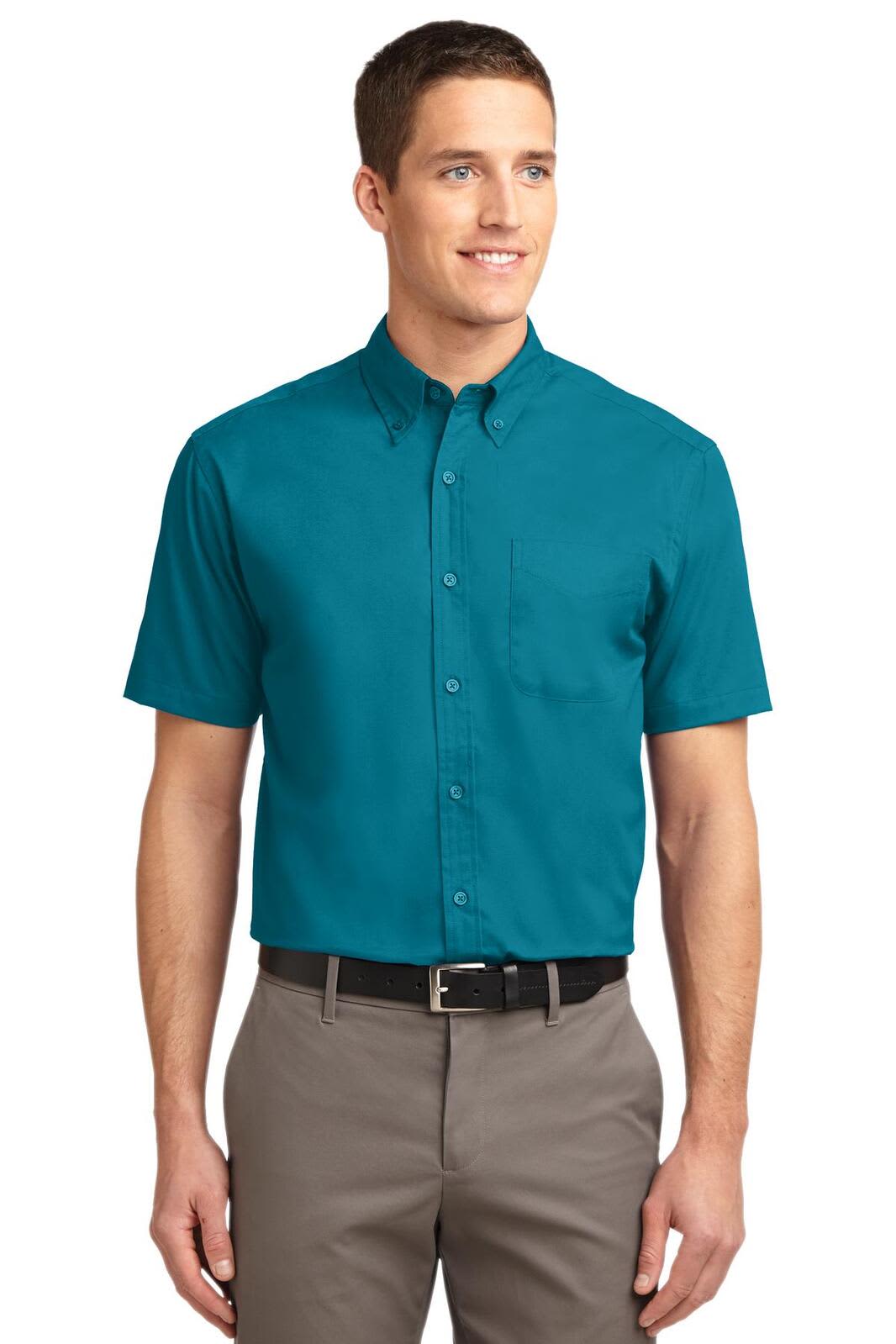 A short sleeve button-up shirt in a vibrant teal colour, featuring a front pocket and a logo.