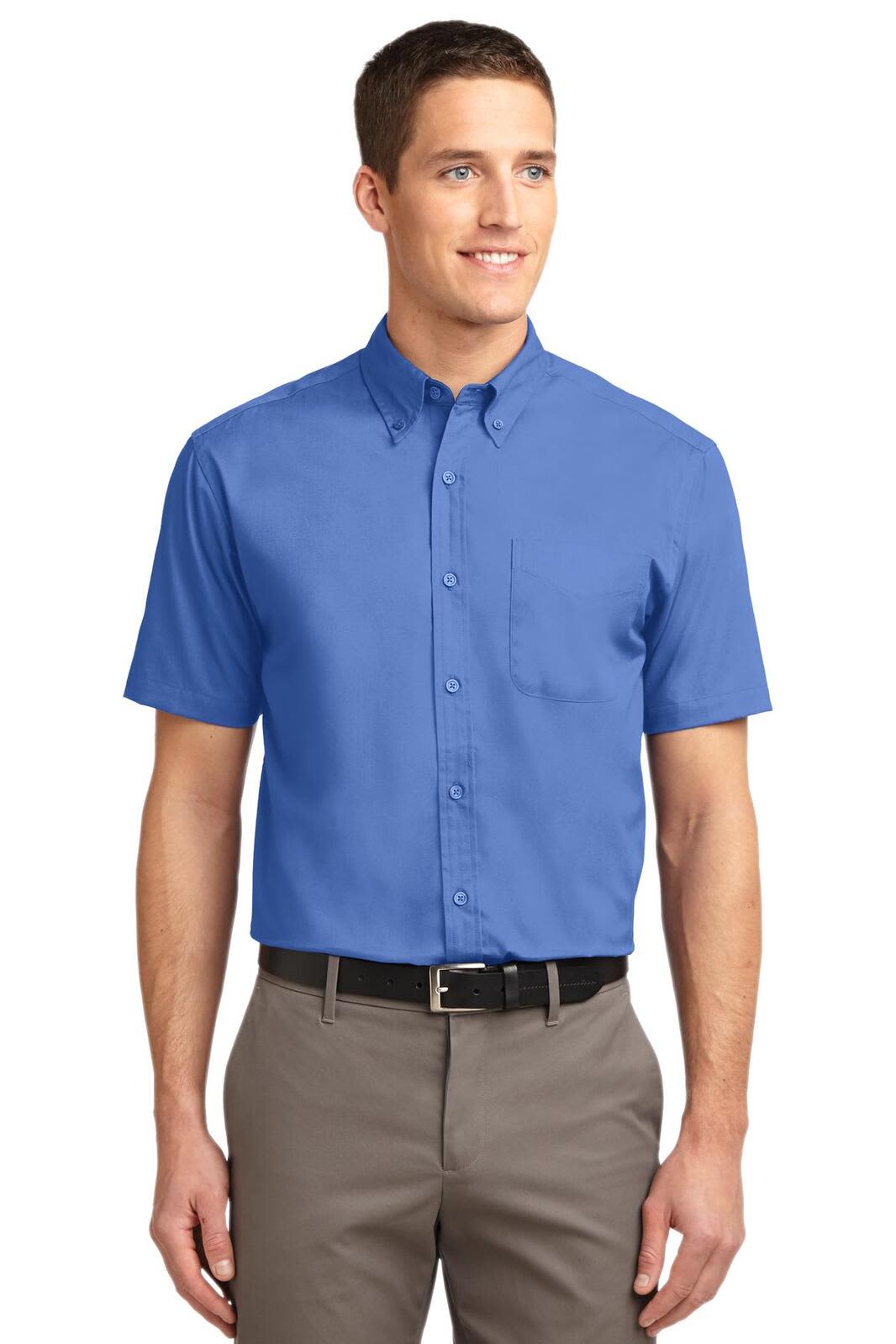 A blue short sleeve button-up shirt with a collar and a pocket. Features a logo on the chest.