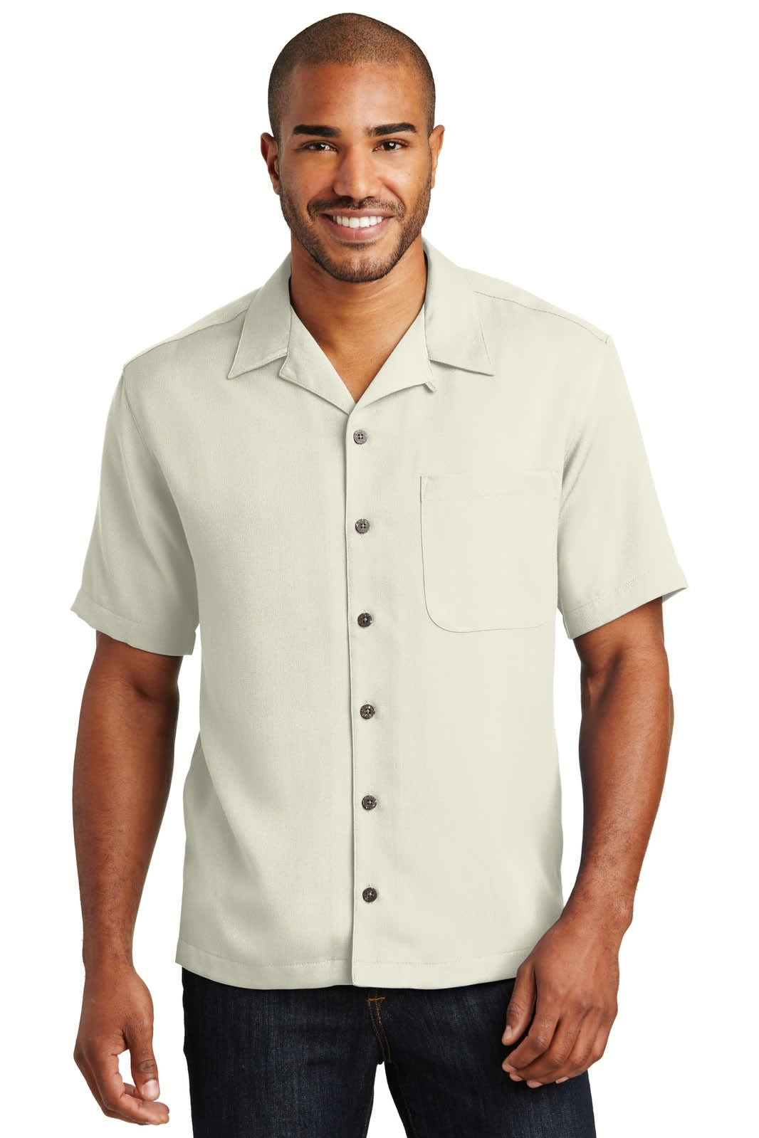 A short-sleeved, button-up shirt in a light beige colour, featuring a chest pocket and a branding logo.