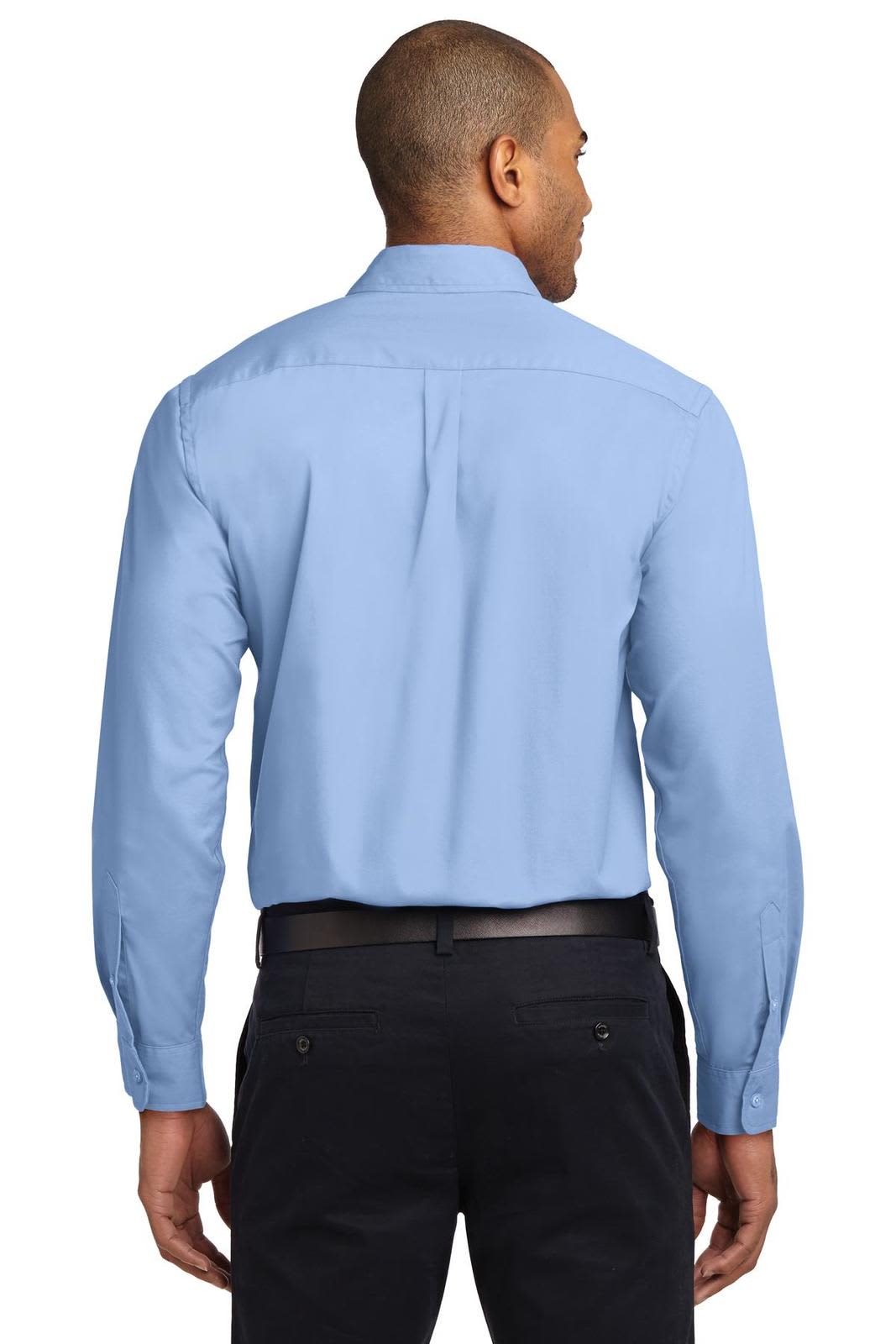 A long sleeve button-up shirt in light blue, featuring a back yoke and a logo.