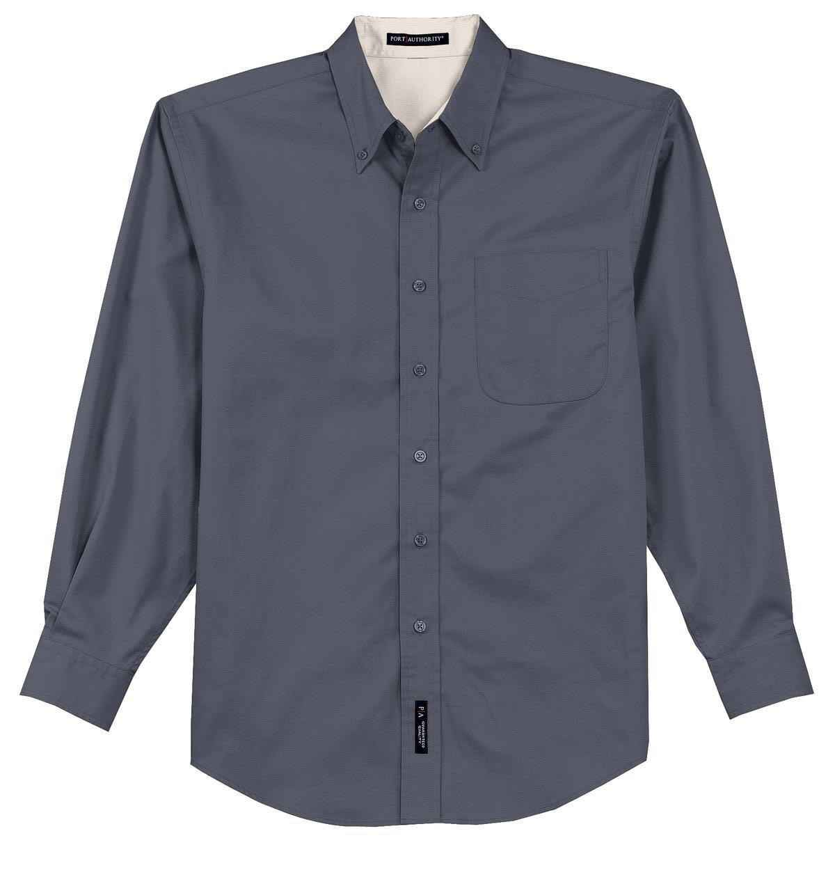 A long sleeve button-up shirt in dark grey with a pocket and a logo on the hem.