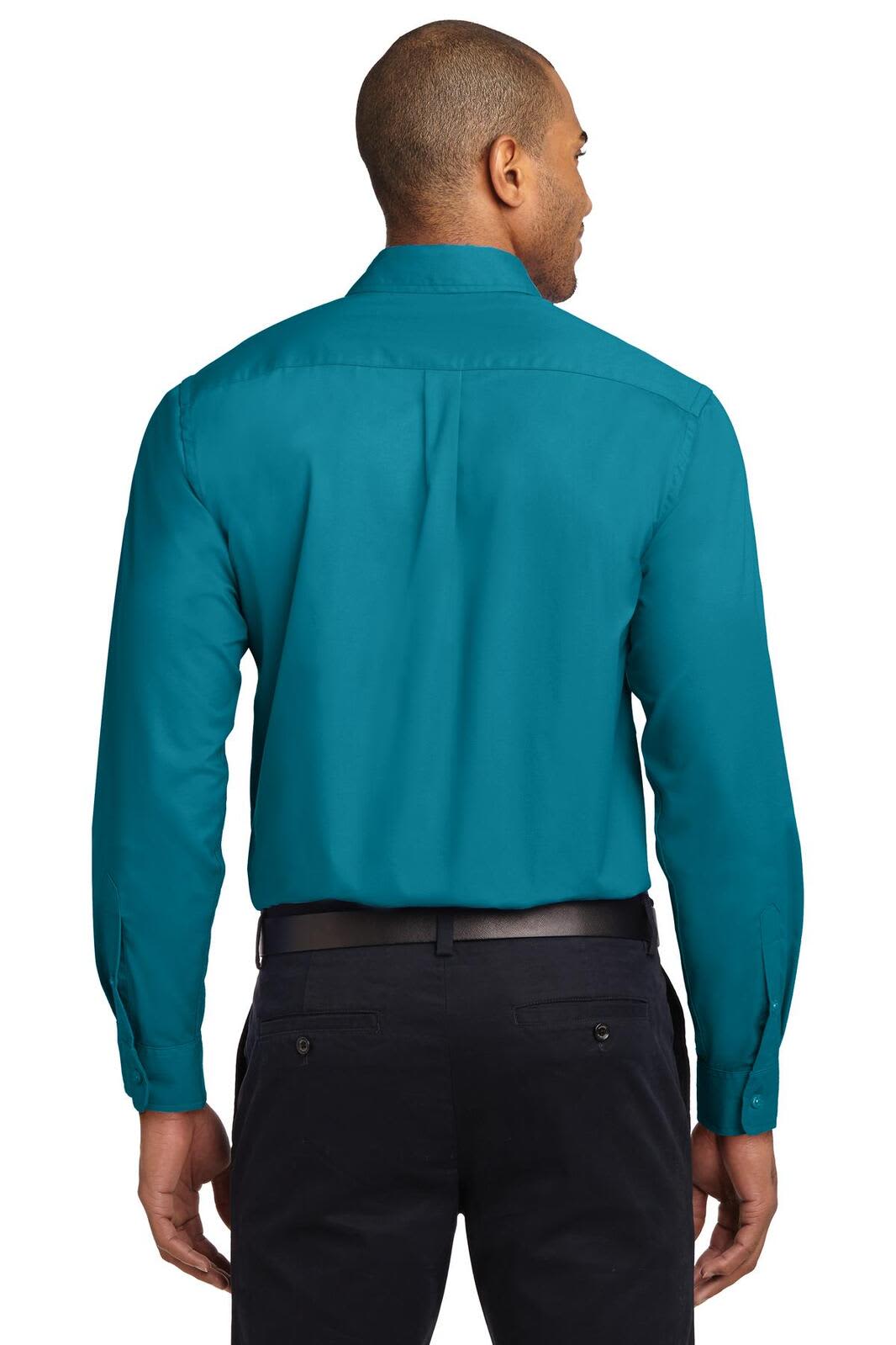 A man is wearing a teal long sleeve button-up shirt, showing the back view. The shirt features a simple design and has a logo.