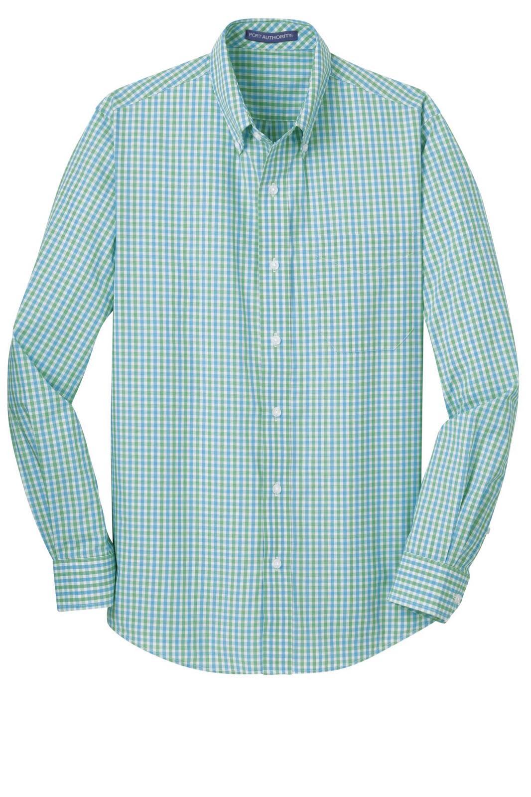 A long sleeve button-up shirt in green and blue gingham pattern with a logo on the chest pocket.