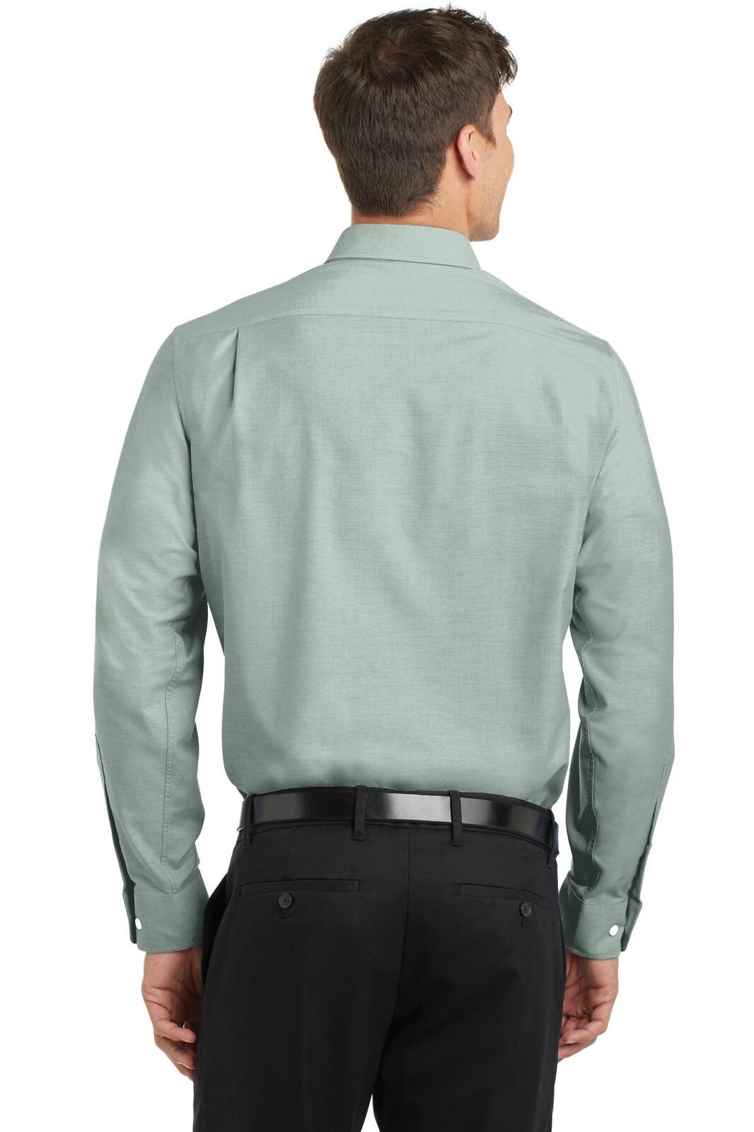 A light green button-up shirt with long sleeves, featuring a back view of a model. Includes a logo on the shirt.