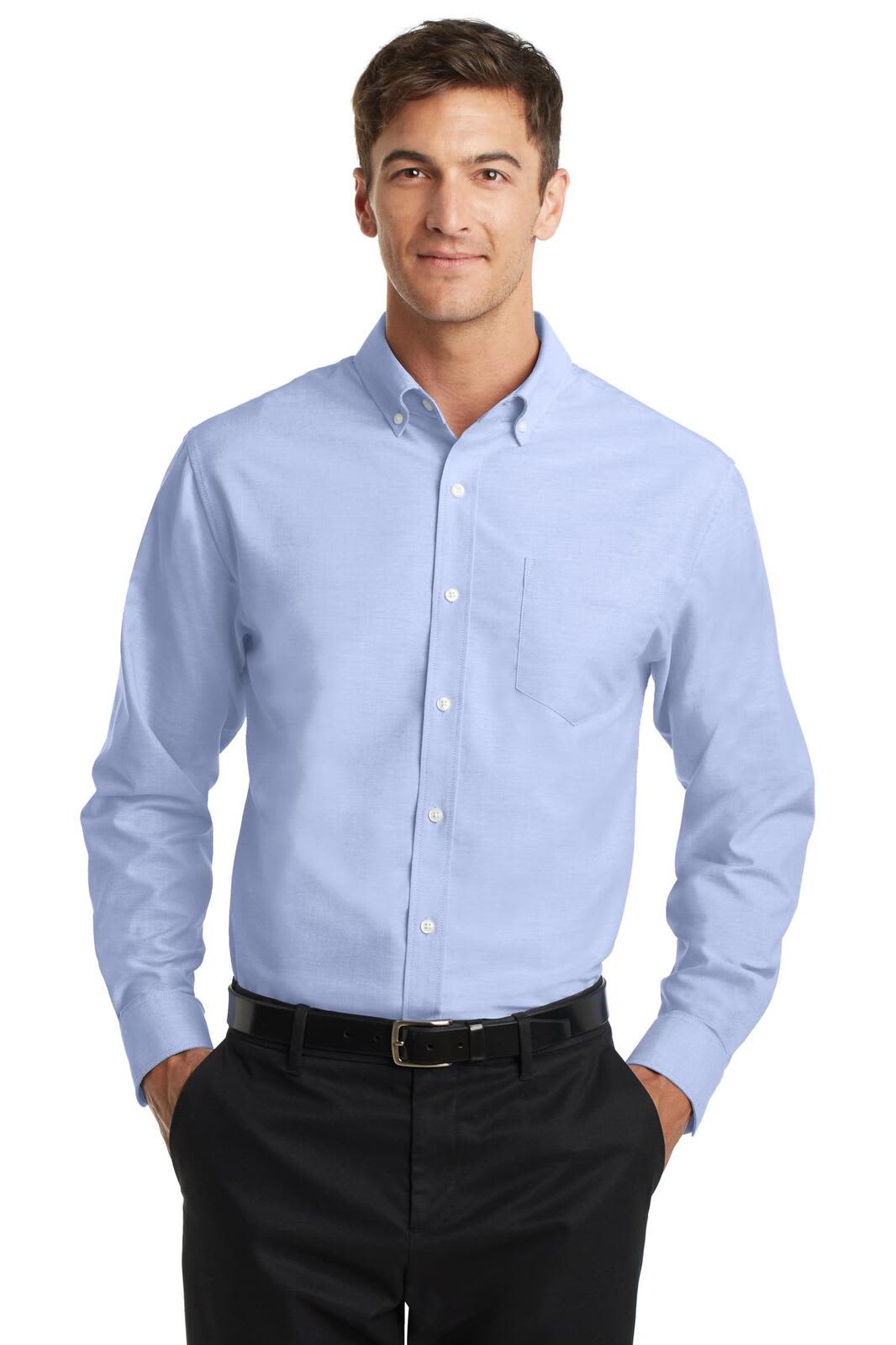 A light blue button-up shirt with a collar and a chest pocket, worn by a man with a black belt and dark trousers.