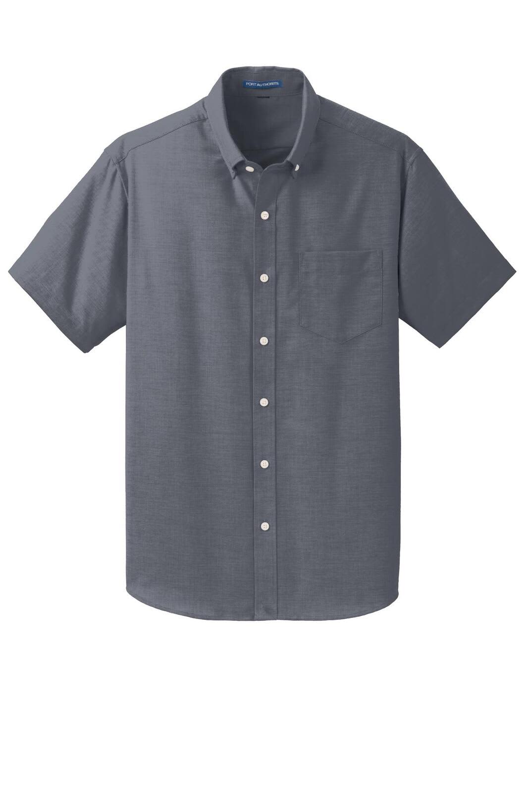 A dark grey short sleeve button-up shirt with a front pocket and a branding logo on the collar.