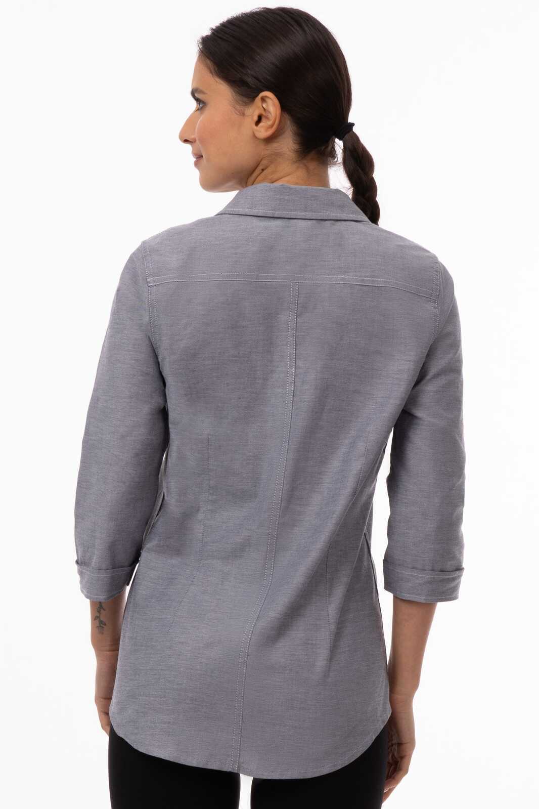 A grey women's classic shirt with a collar and three-quarter sleeves, featuring a subtle texture and an embroidered logo.