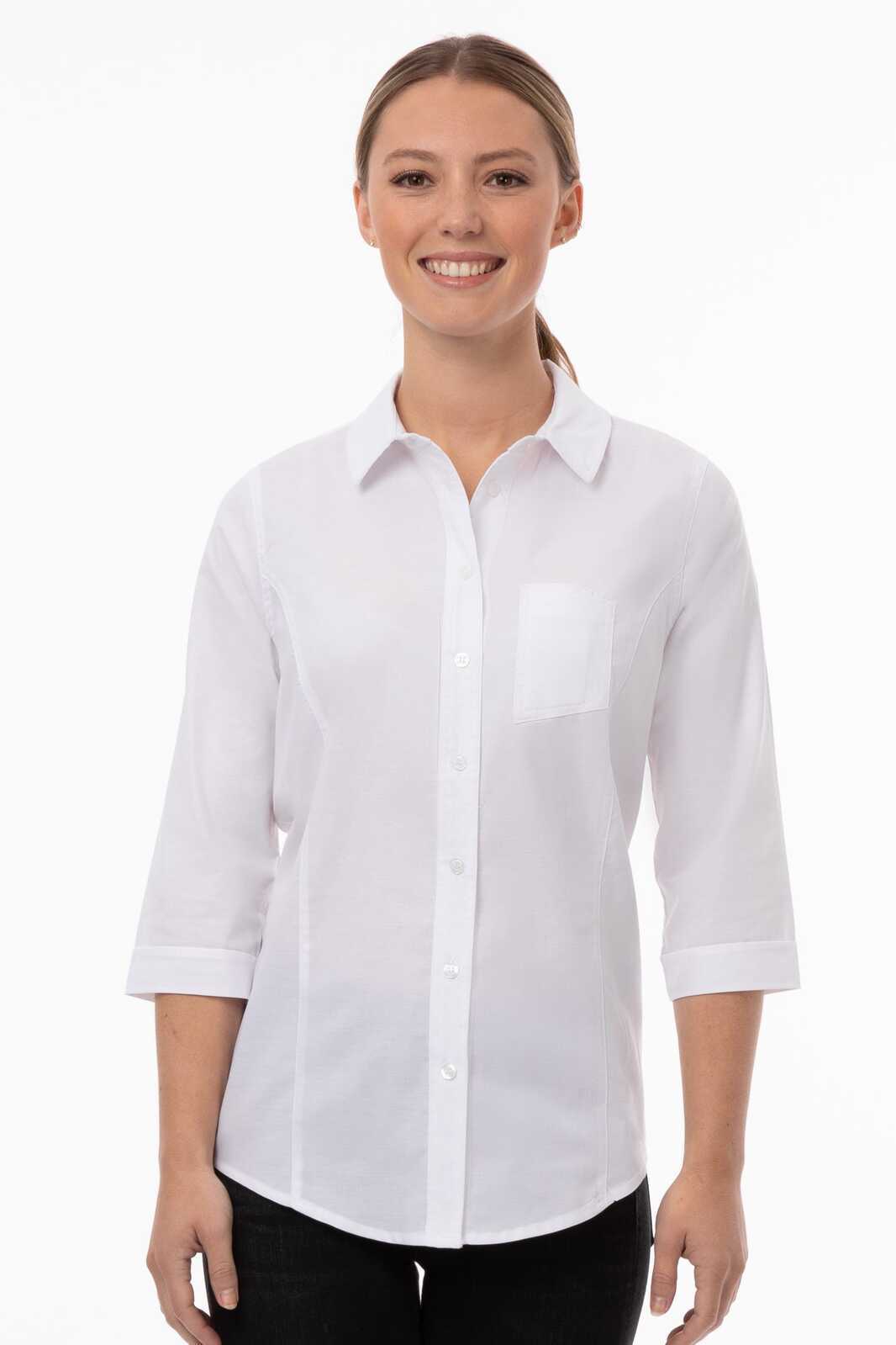 A white women's classic shirt with a collar and three-quarter sleeves, featuring a pocket and a logo.