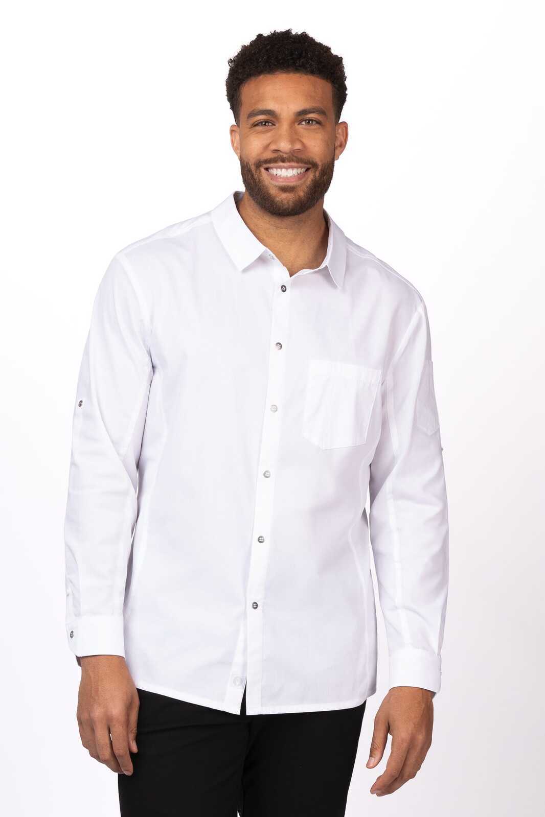 A man wearing a long-sleeve white shirt with a button-up front and a chest pocket. The shirt features a logo.