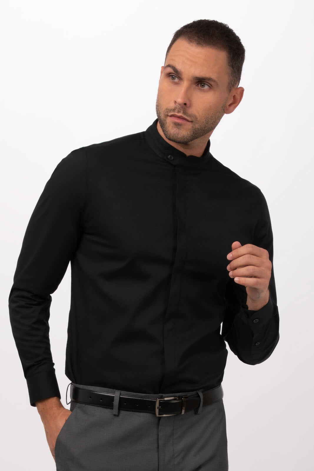 A men's black button-up shirt with a collar, featuring long sleeves and a fitted design. It has a logo on the chest.