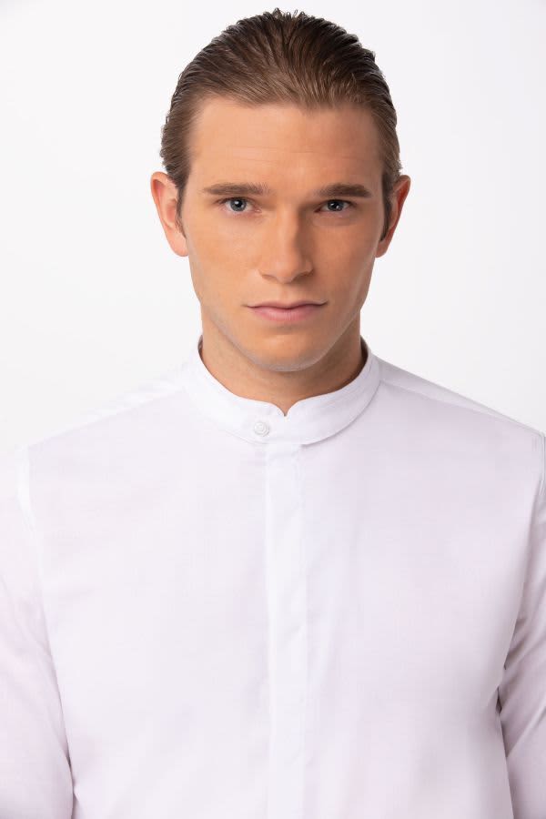 A white button-up shirt for men, featuring a modern design and a logo on the fabric.