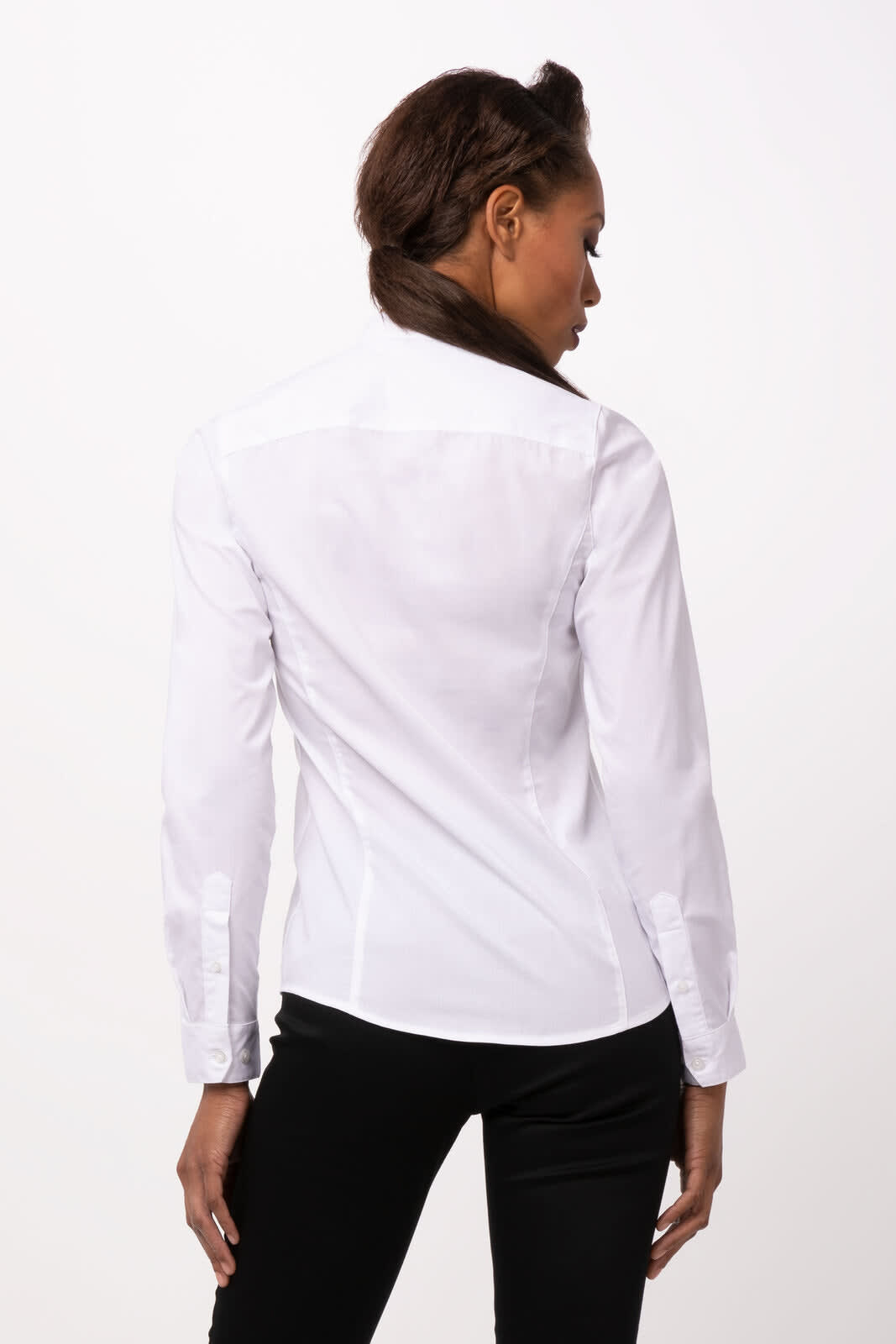 A white button-up women's shirt with long sleeves and a fitted design, featuring a logo on the back.