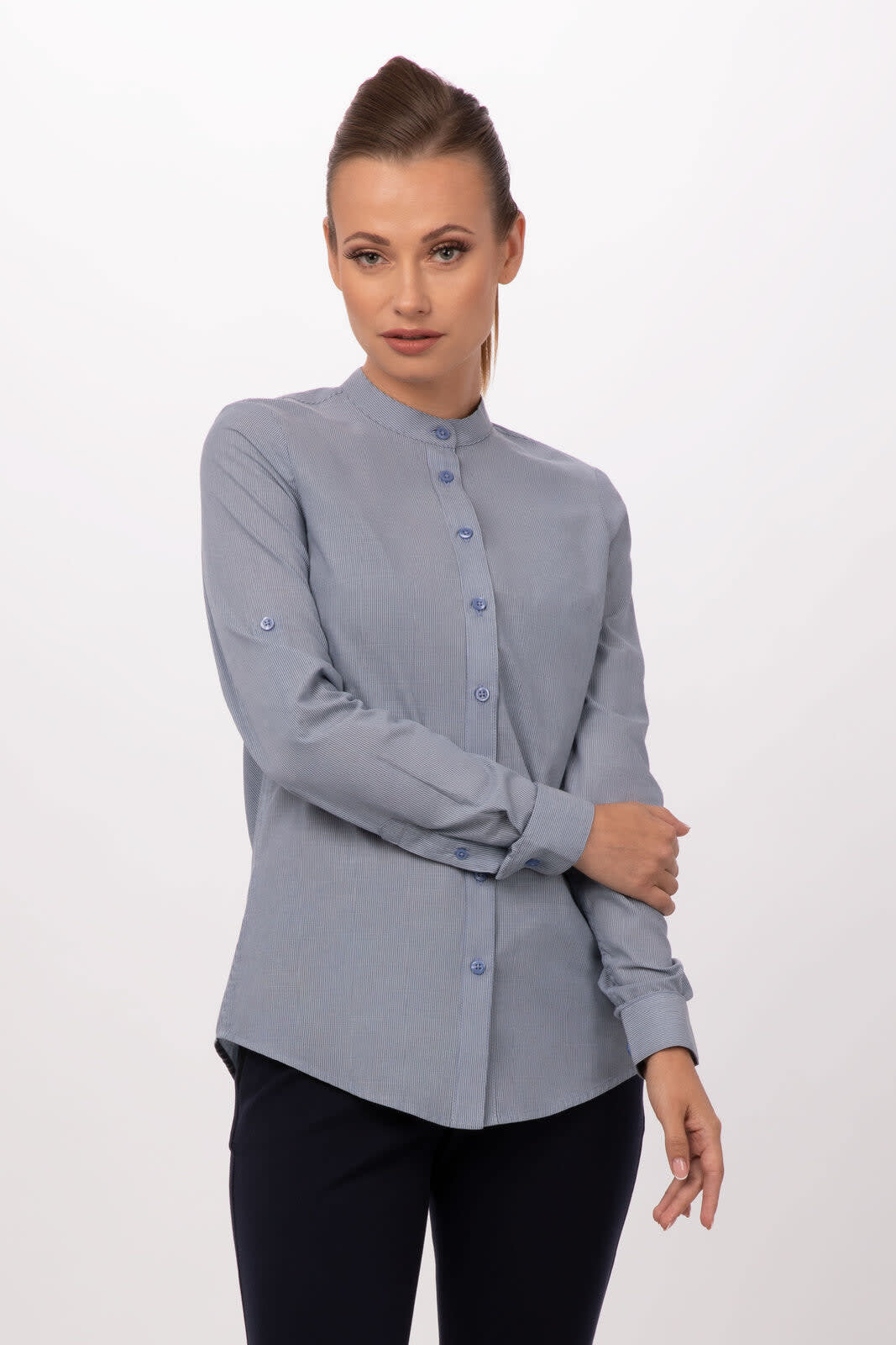 A women's button-up shirt in light blue with a stand collar and long sleeves, featuring buttons down the front.