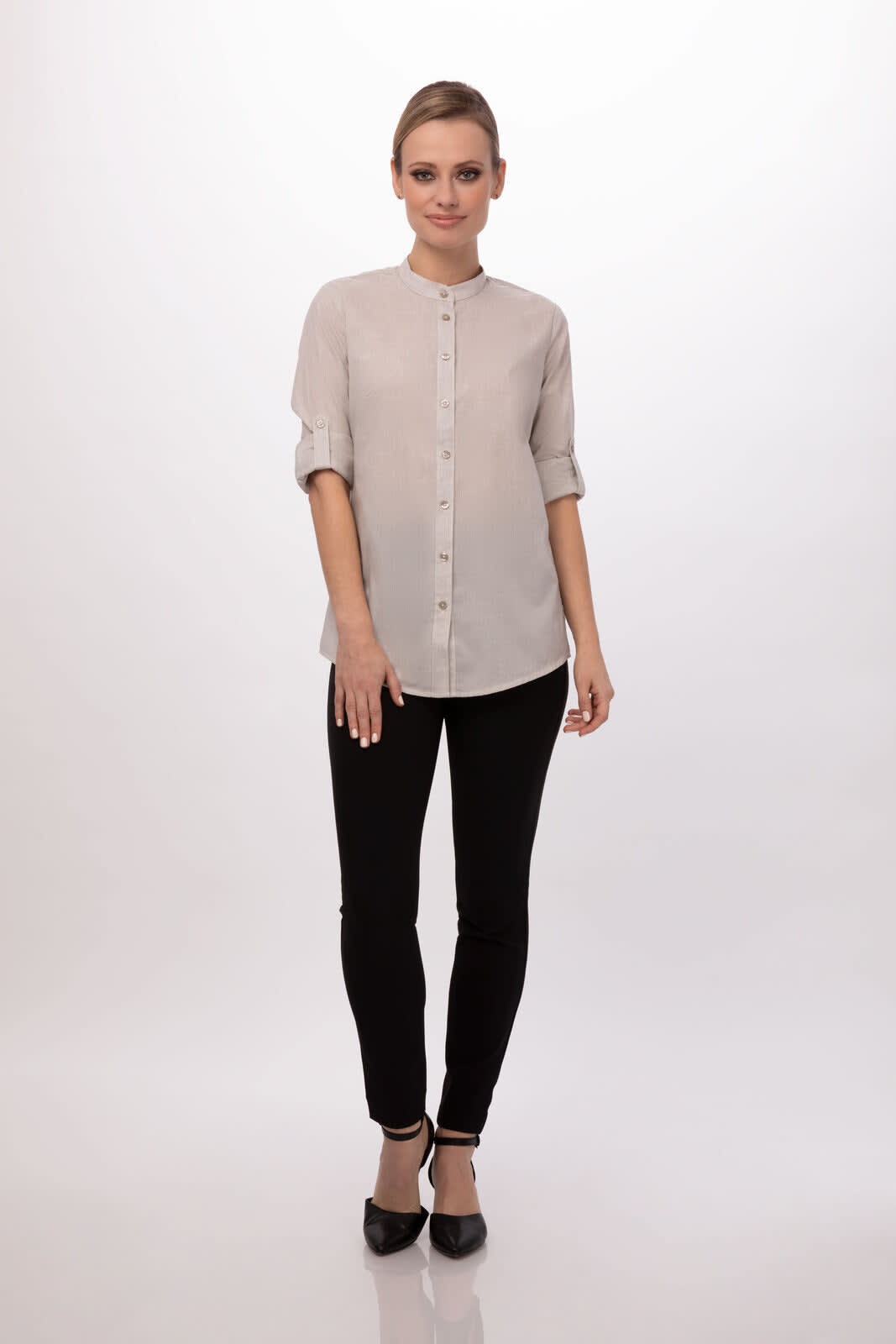 A button-up women's shirt in light grey, featuring a collarless design and rolled sleeves, paired with black pants.