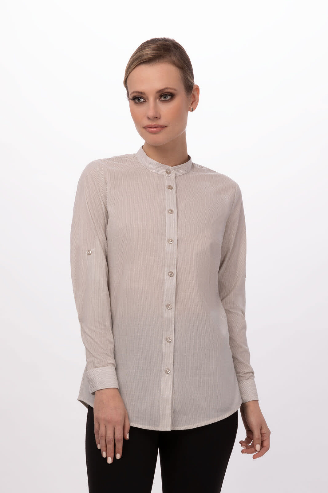 A light beige women's button-up shirt with long sleeves and a collar, featuring a small logo on the sleeve.