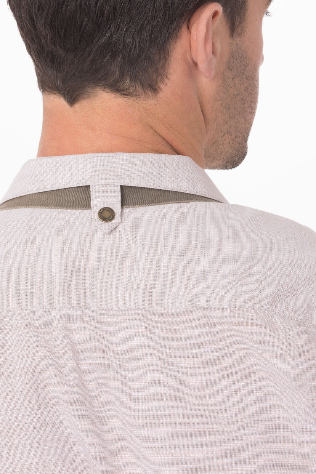 A men's shirt in light beige with a contrasting collar detail and a small logo on the back.