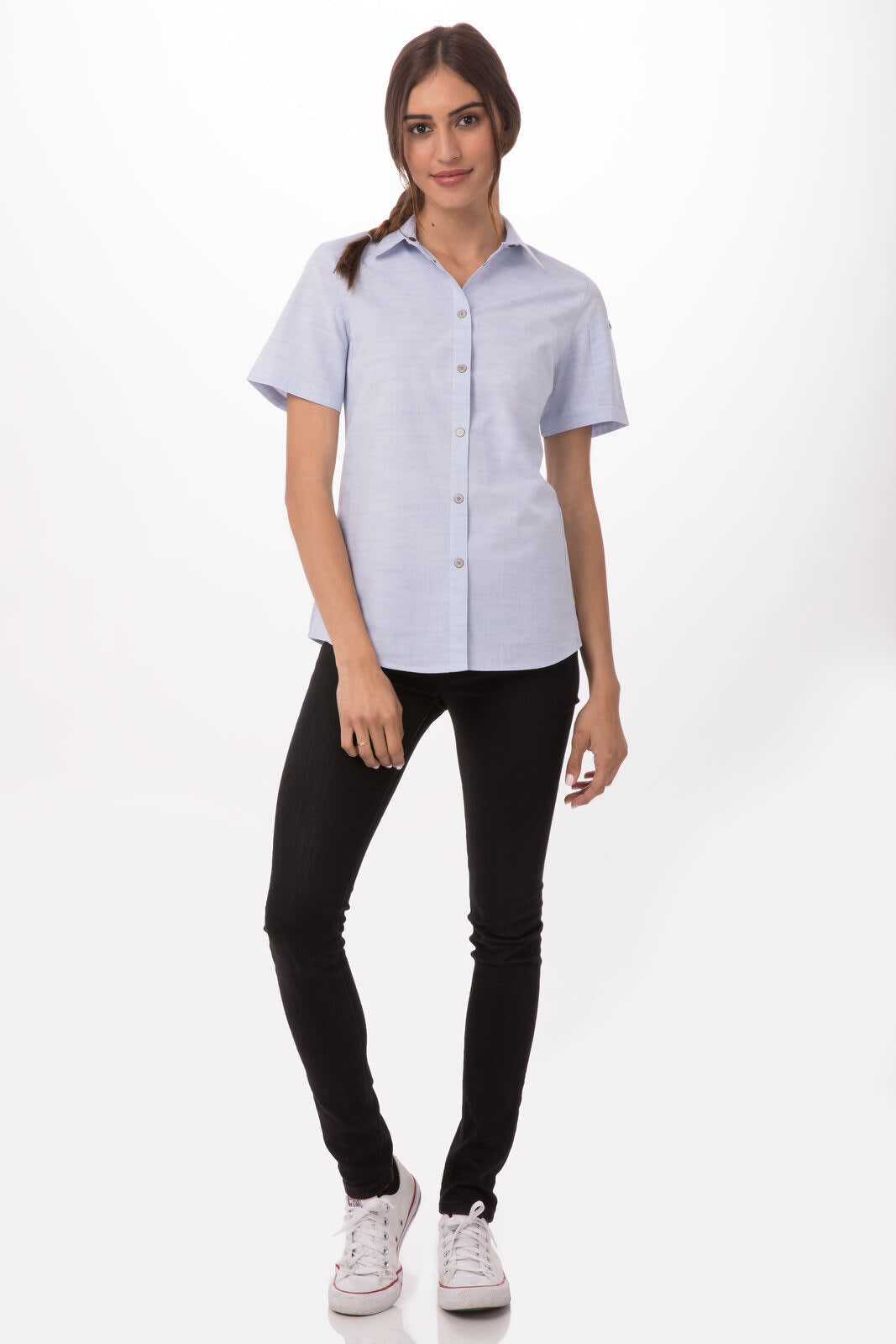 A light blue button-up women's shirt with short sleeves and a fitted silhouette, paired with black pants.