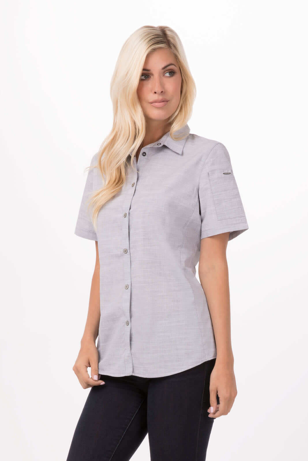 A grey button-up women's shirt with a collar and short sleeves, featuring a logo on the sleeve.