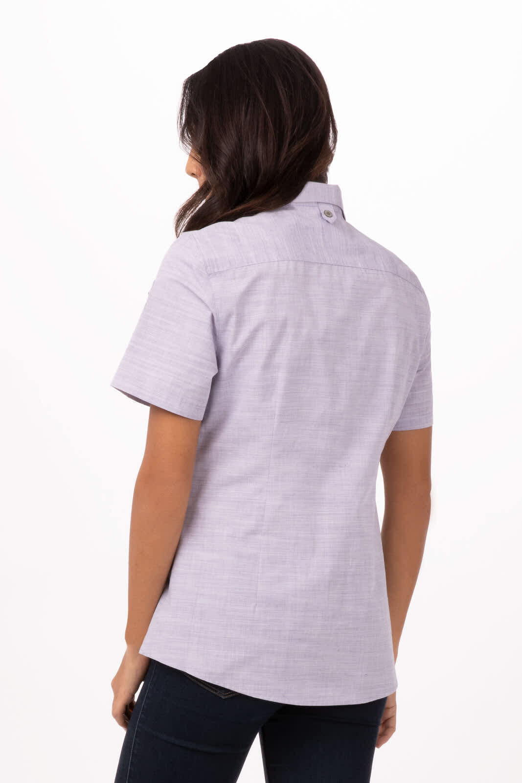 A short-sleeved, button-up women's shirt in a light purple hue, featuring a back collar and fitted design.