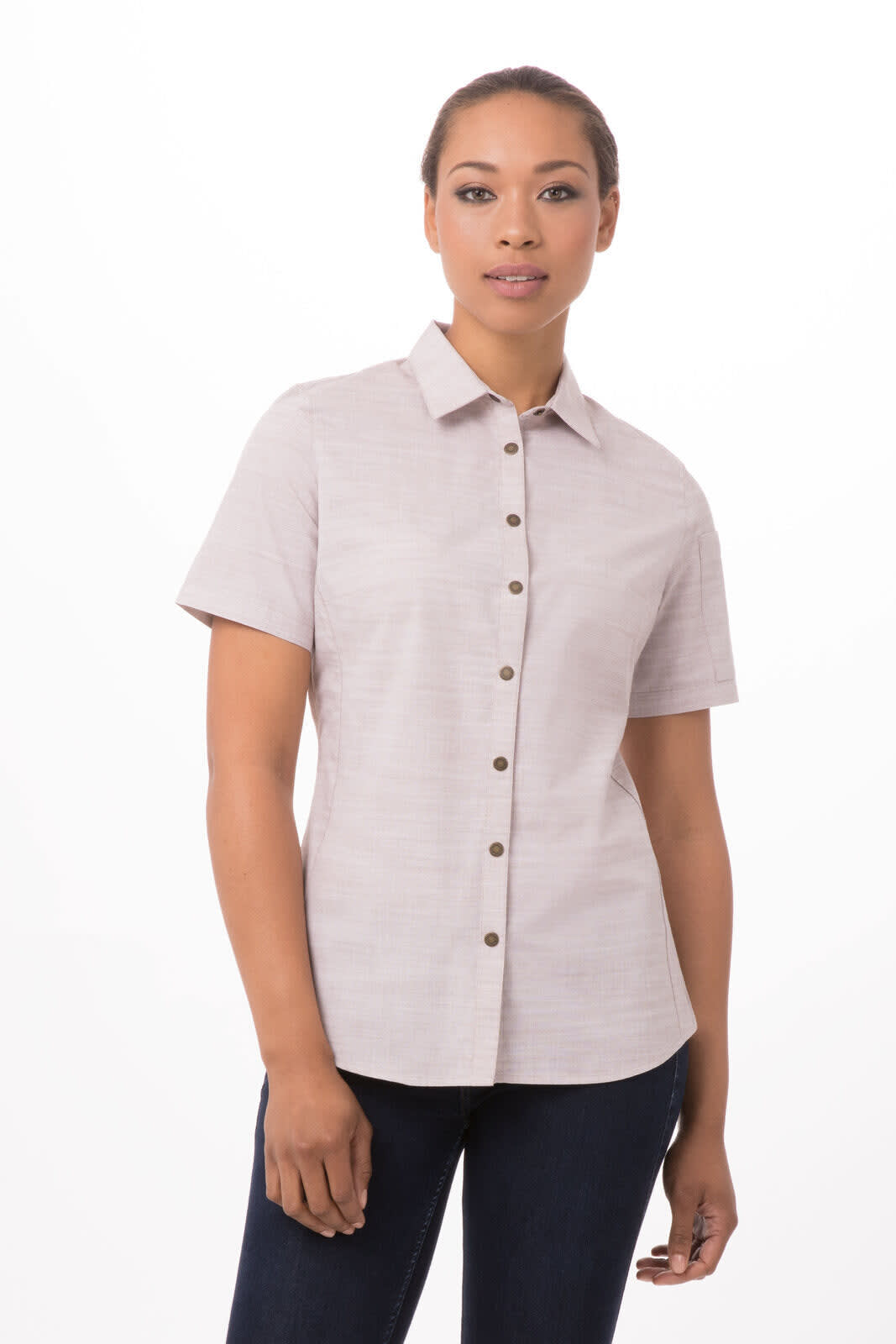 A short-sleeved, button-up women's shirt in a light, neutral tone with a collar and a logo.