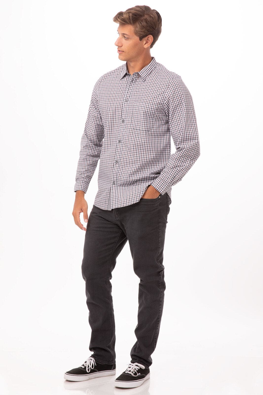 A modern gingham men's long sleeve dress shirt in black and white, paired with black jeans and sneakers.