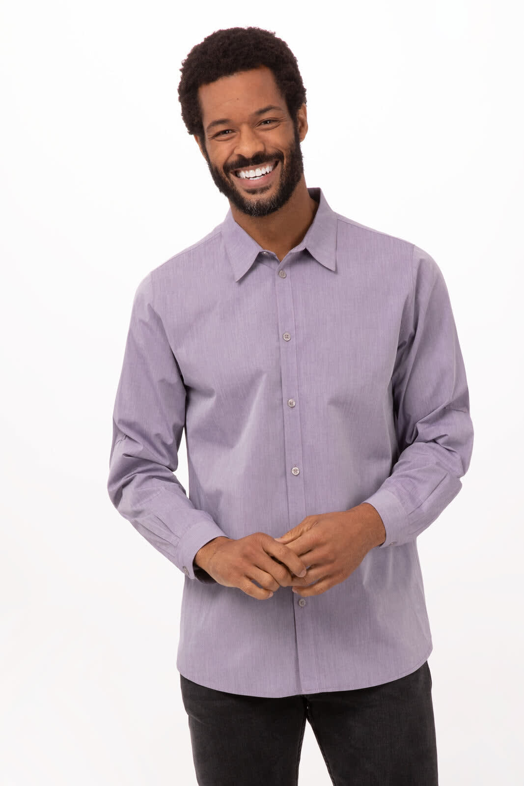 A man wearing a modern chambray dress shirt in light purple, featuring a button-up design and long sleeves.