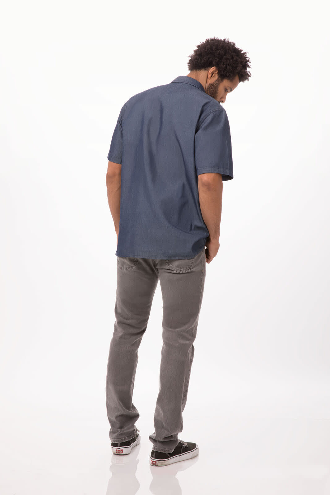 A men's short sleeve denim shirt in navy blue, featuring a button-up design and a logo at the back.