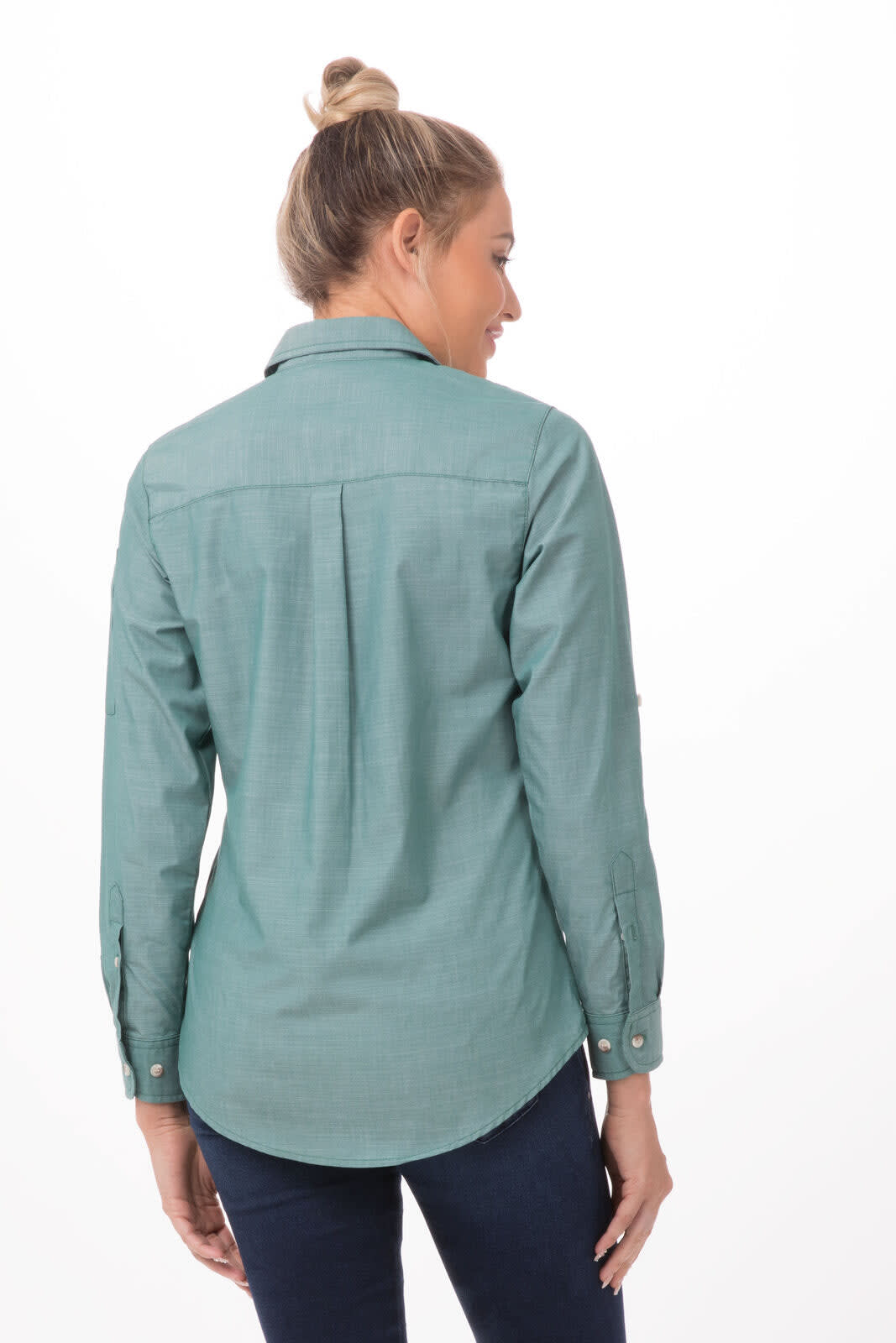 A women's chambray shirt in a soft teal colour with long sleeves and a button-down collar. It features a back yoke design.