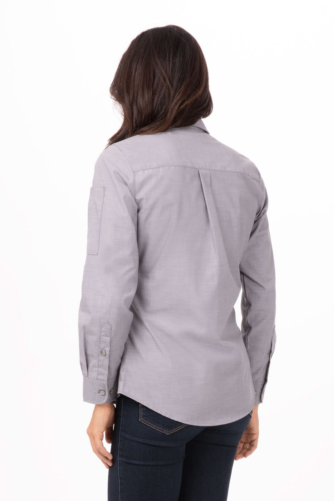 A grey chambray women's shirt featuring long sleeves and a collar, with a back yoke and buttoned cuffs.
