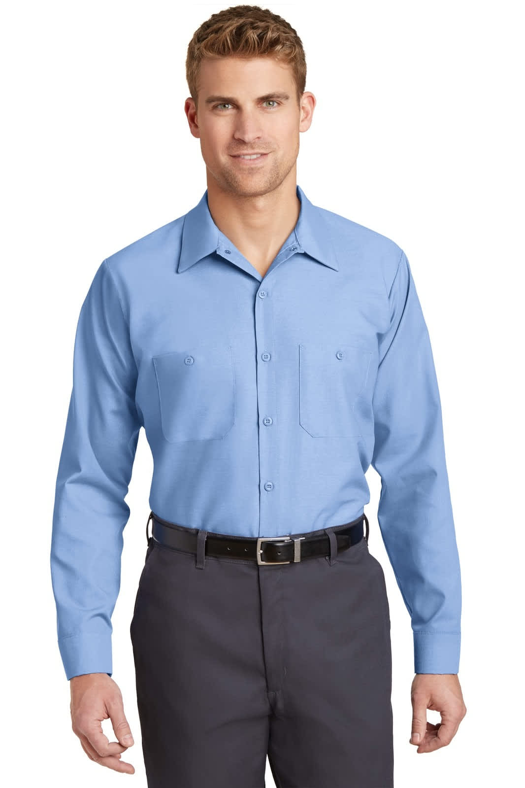 A light blue long sleeve industrial work shirt with a collar and two front pockets, worn by a model.